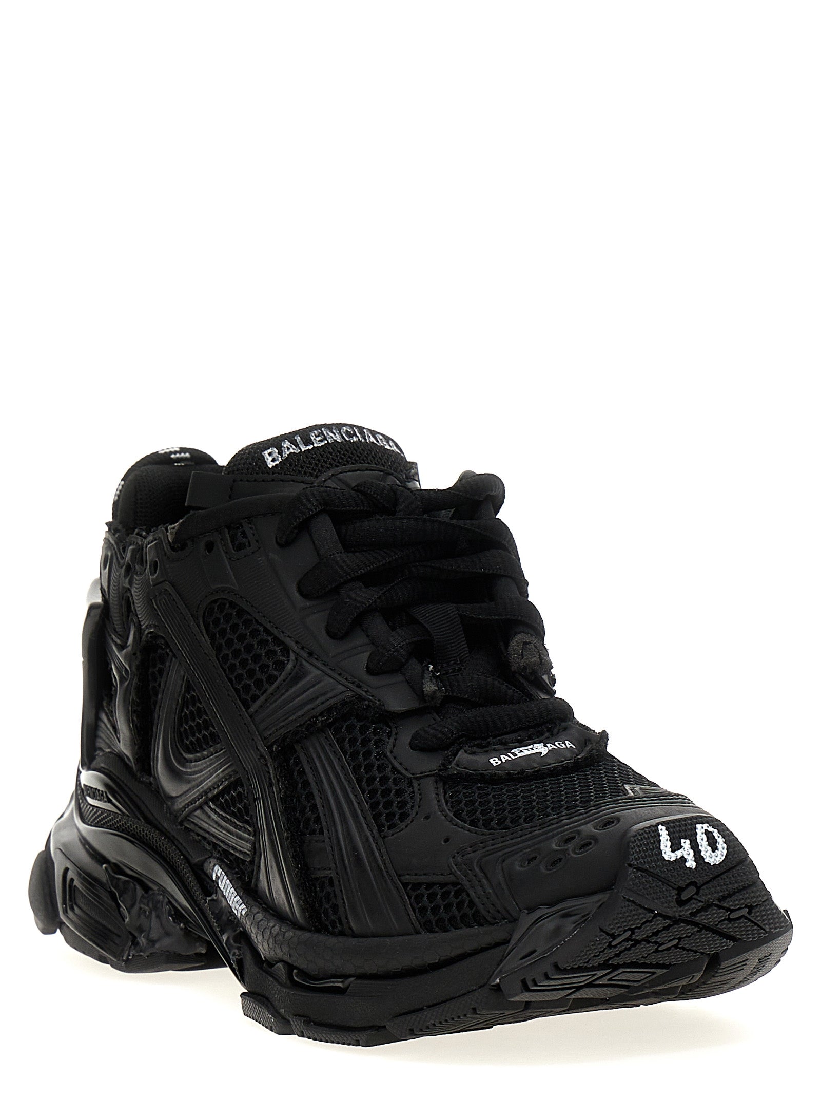 Indulge in the exquisite Balenciaga Black Polyester Athletic Sneakers, where luxurious craftsmanship meets modern elegance, perfect for the discerning individual.