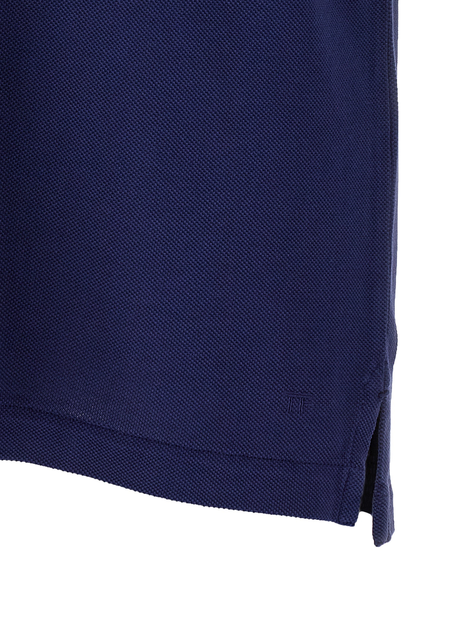 Discover the Tom Ford Blue Lyocell Polo Shirt, a blend of luxurious craftsmanship and timeless elegance, perfect for those who embody sophistication and style.