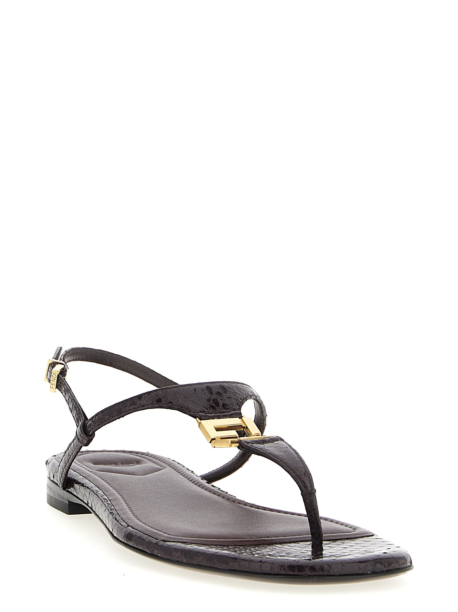 Step into luxury with Fendi's Purple Elastane Flat Sandals, crafted from 100% ayers in Italy. A bold statement of elegance and comfort for the discerning individual.