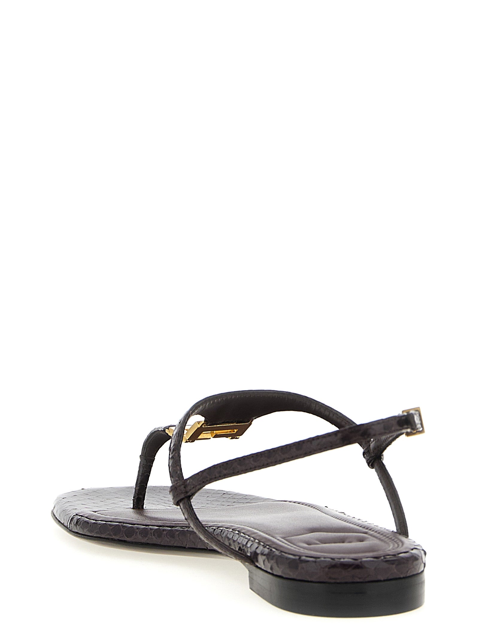Step into luxury with Fendi's Purple Elastane Flat Sandals, crafted from 100% ayers in Italy, where bold design meets timeless elegance for the discerning individual.