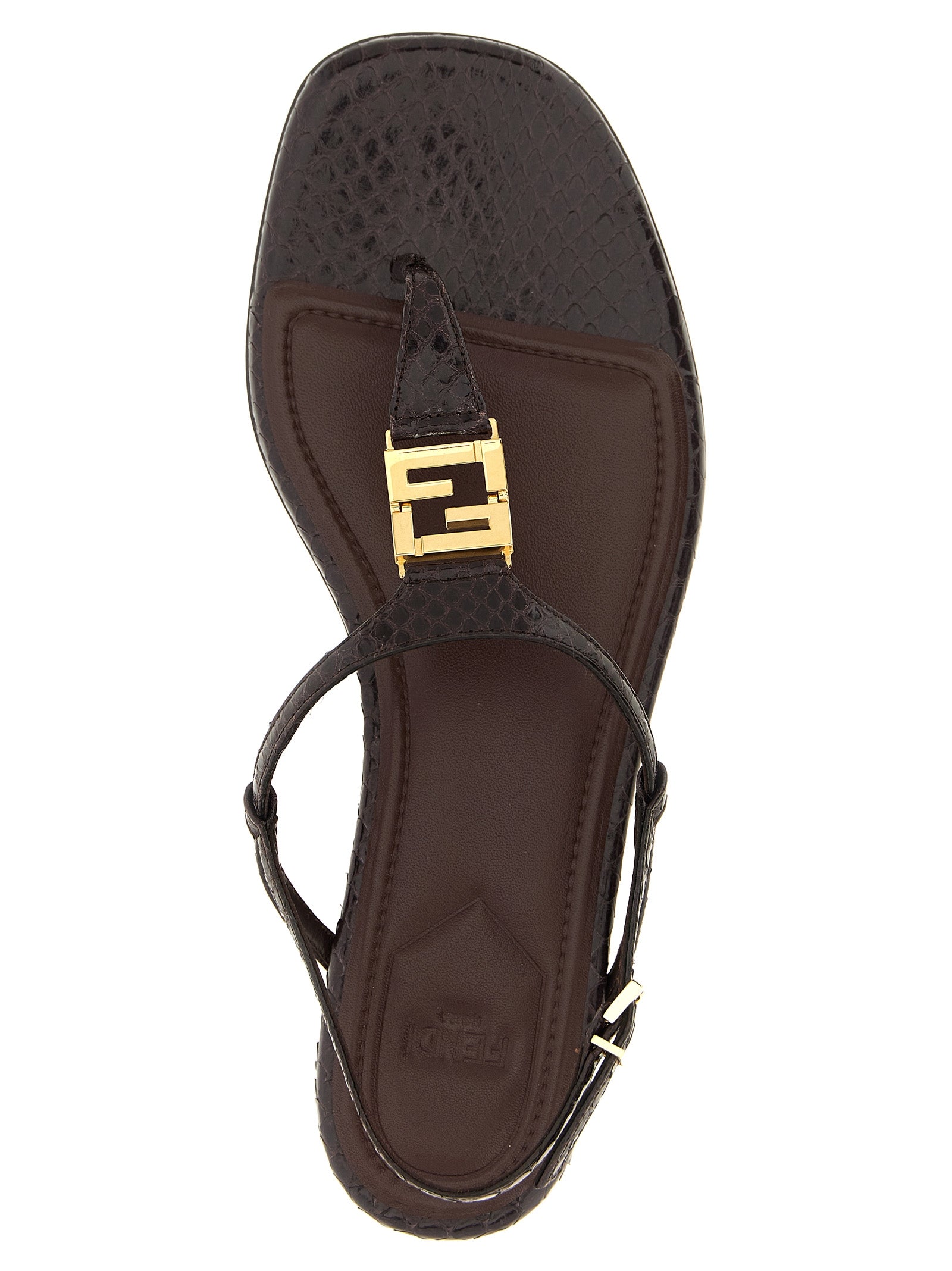 Step into luxury with Fendi's Purple Elastane Flat Sandals, crafted from 100% ayers in Italy. Elevate your style with striking design and unmatched comfort.