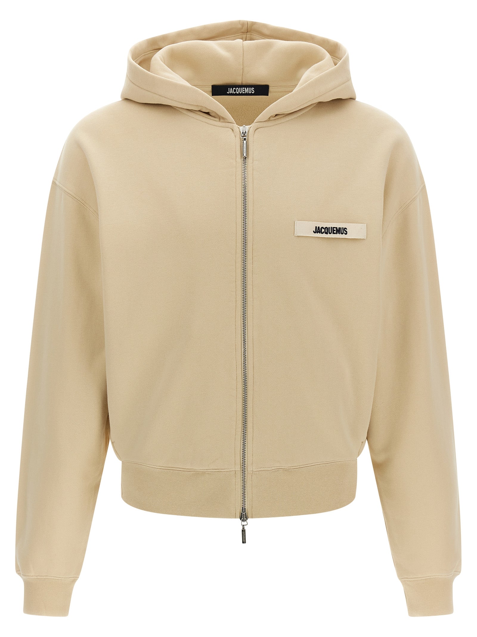 Indulge in the elegance of the Jacquemus Beige Cotton Sweatshirt, a luxurious blend of comfort and sophistication, crafted in Portugal for the discerning connoisseur.