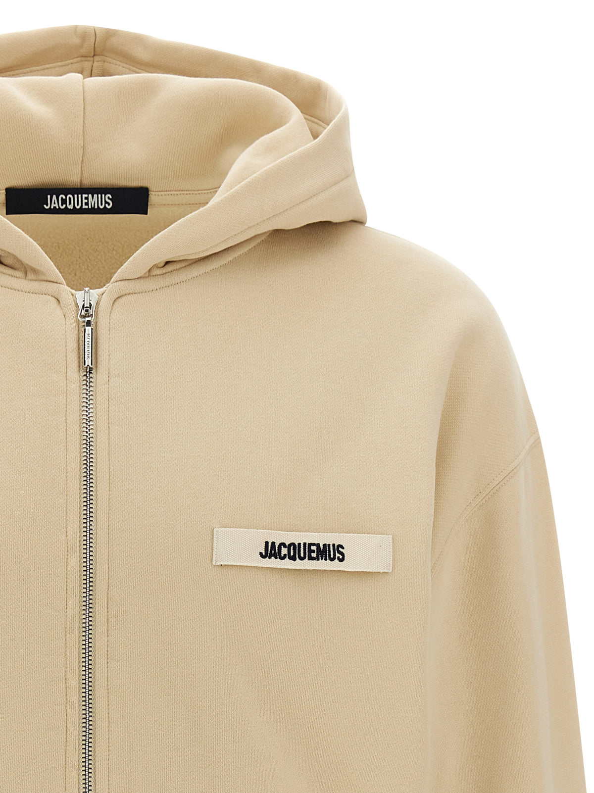 Discover the Jacquemus Beige Cotton Sweatshirt, a luxurious blend of comfort and sophistication, crafted in Portugal for those who appreciate timeless elegance.