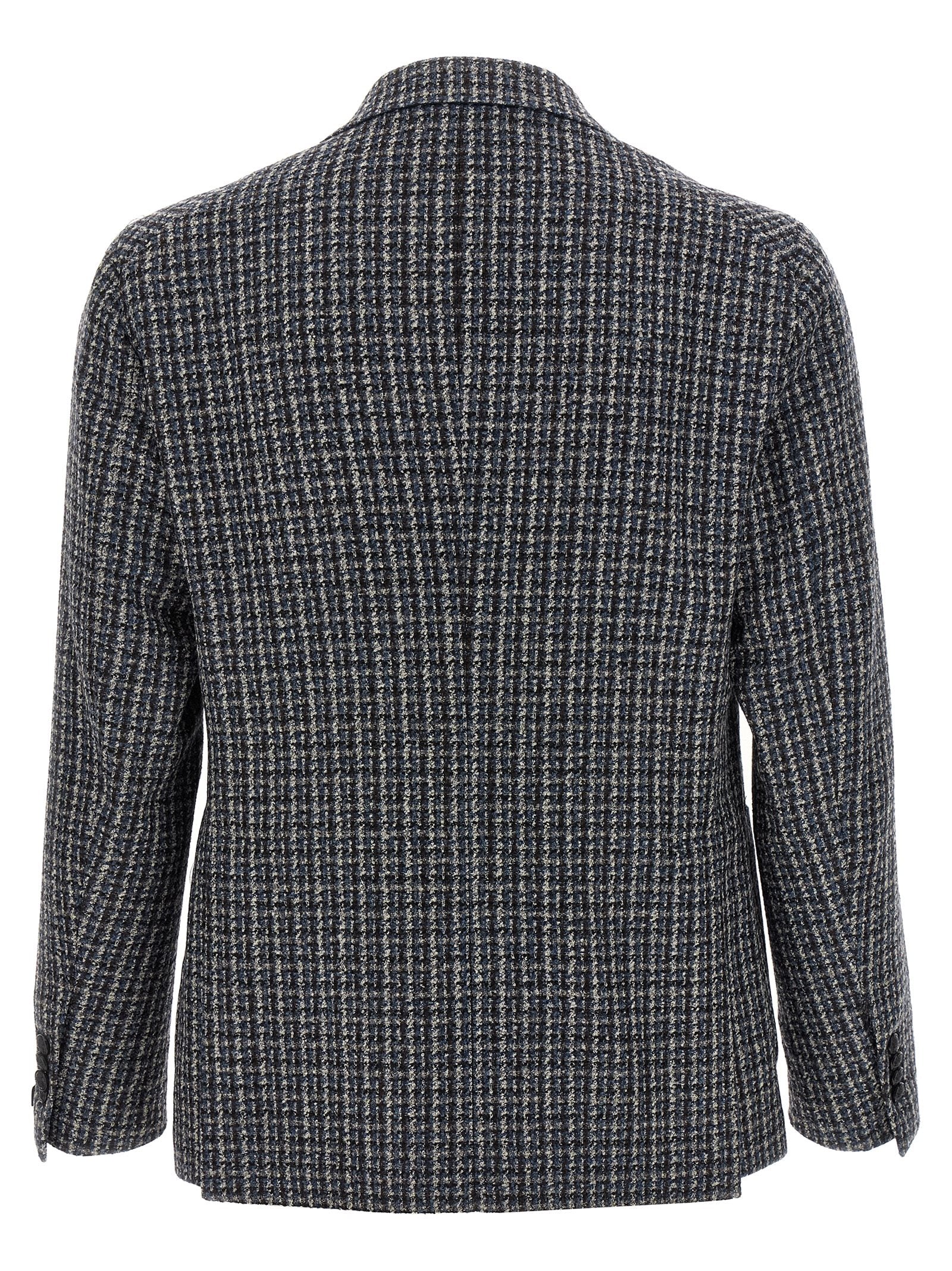 Elevate your style with the Tagliatore Multicolor Virgin Wool Blazer, a luxurious blend of craftsmanship and sophistication, perfect for the discerning individual.