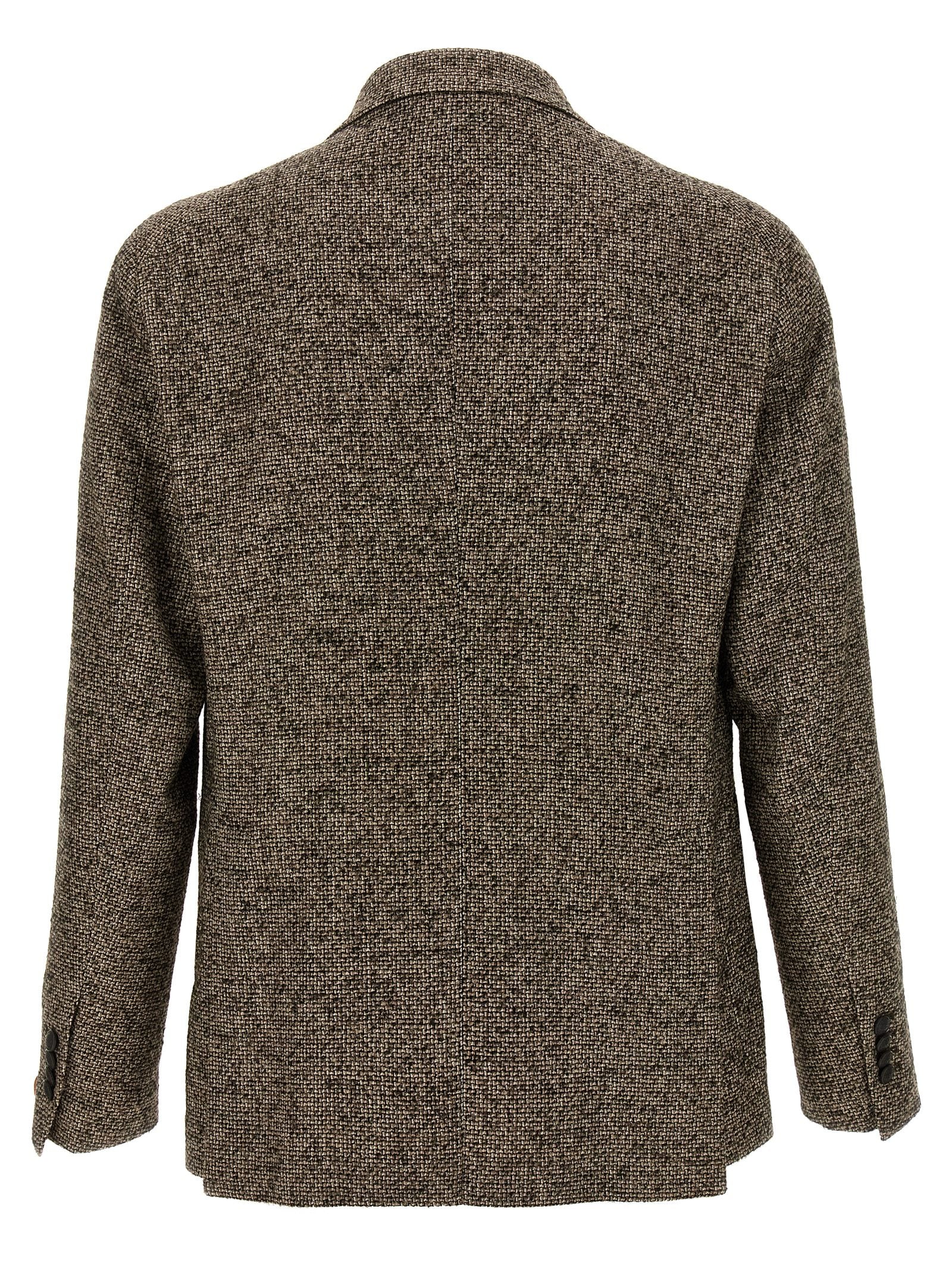 Discover the Tagliatore Brown Virgin Wool Blazer, a masterpiece of Italian craftsmanship, blending luxurious materials for timeless elegance and versatility.