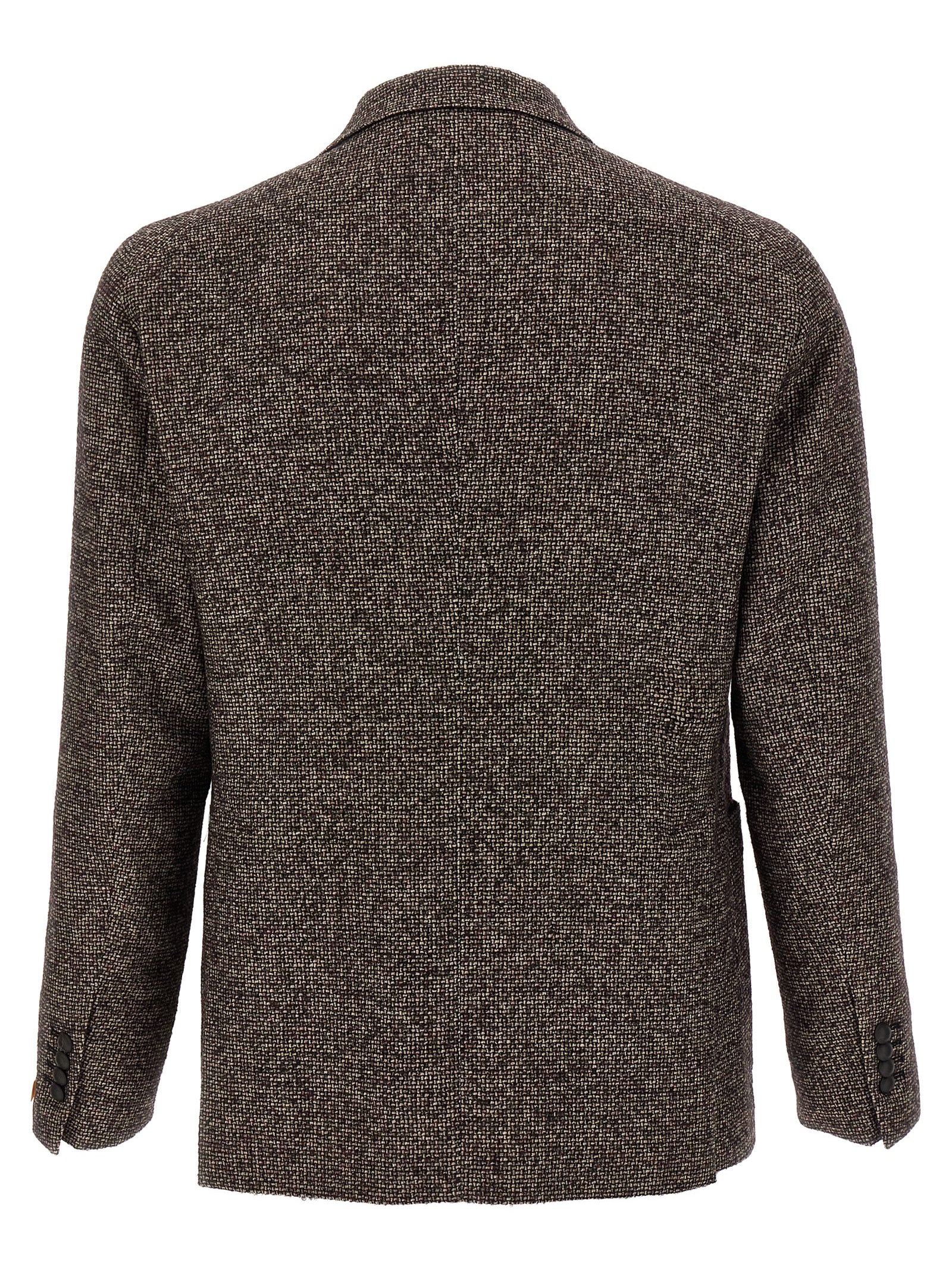 Indulge in the Tagliatore Brown Virgin Wool Blazer, a masterpiece of Italian craftsmanship, blending luxury and sophistication for the discerning individual.