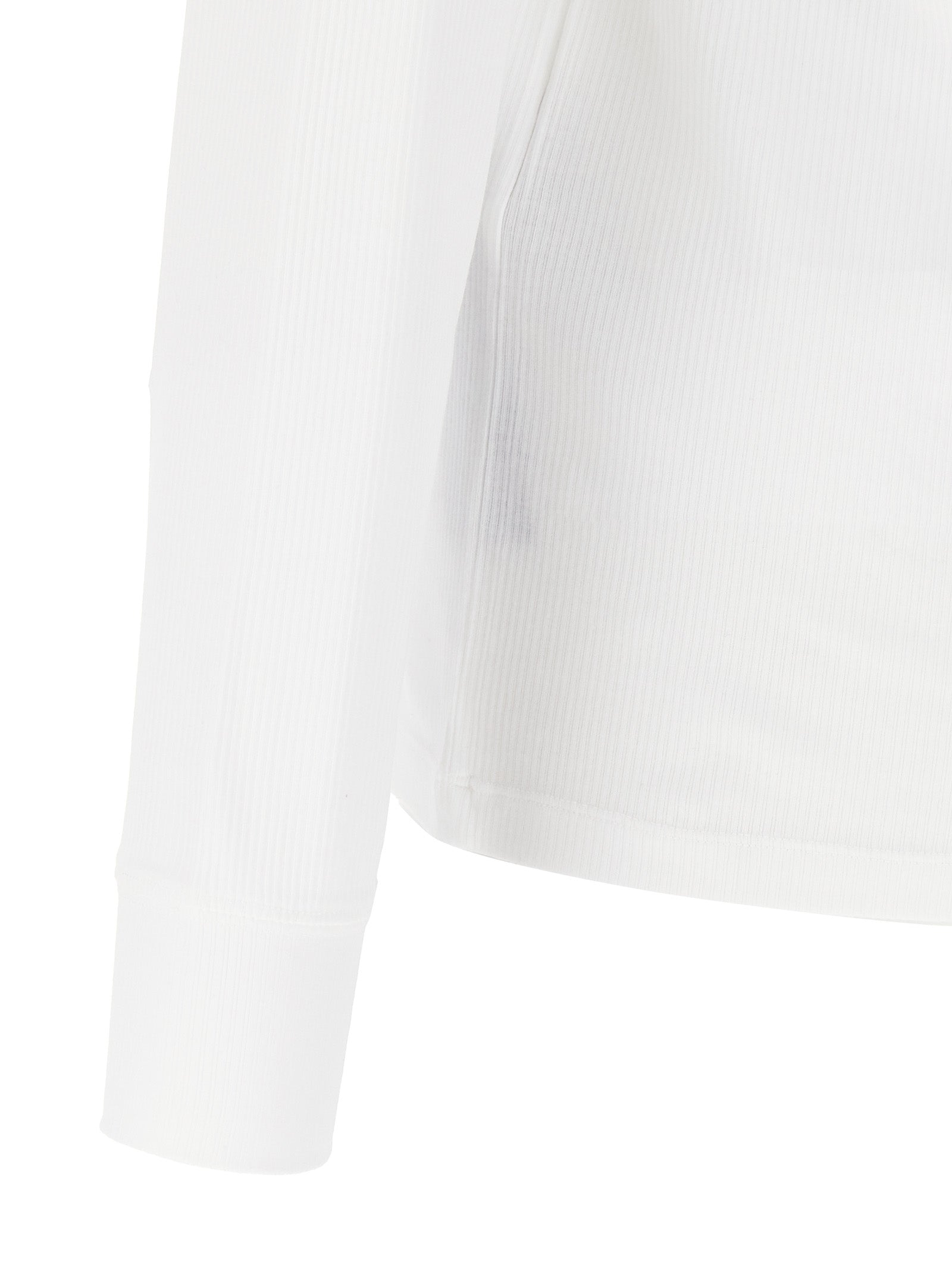 Experience the epitome of luxury with the Tom Ford White Cotton T-Shirt, crafted from a sumptuous cotton blend, embodying timeless sophistication for the discerning individual.