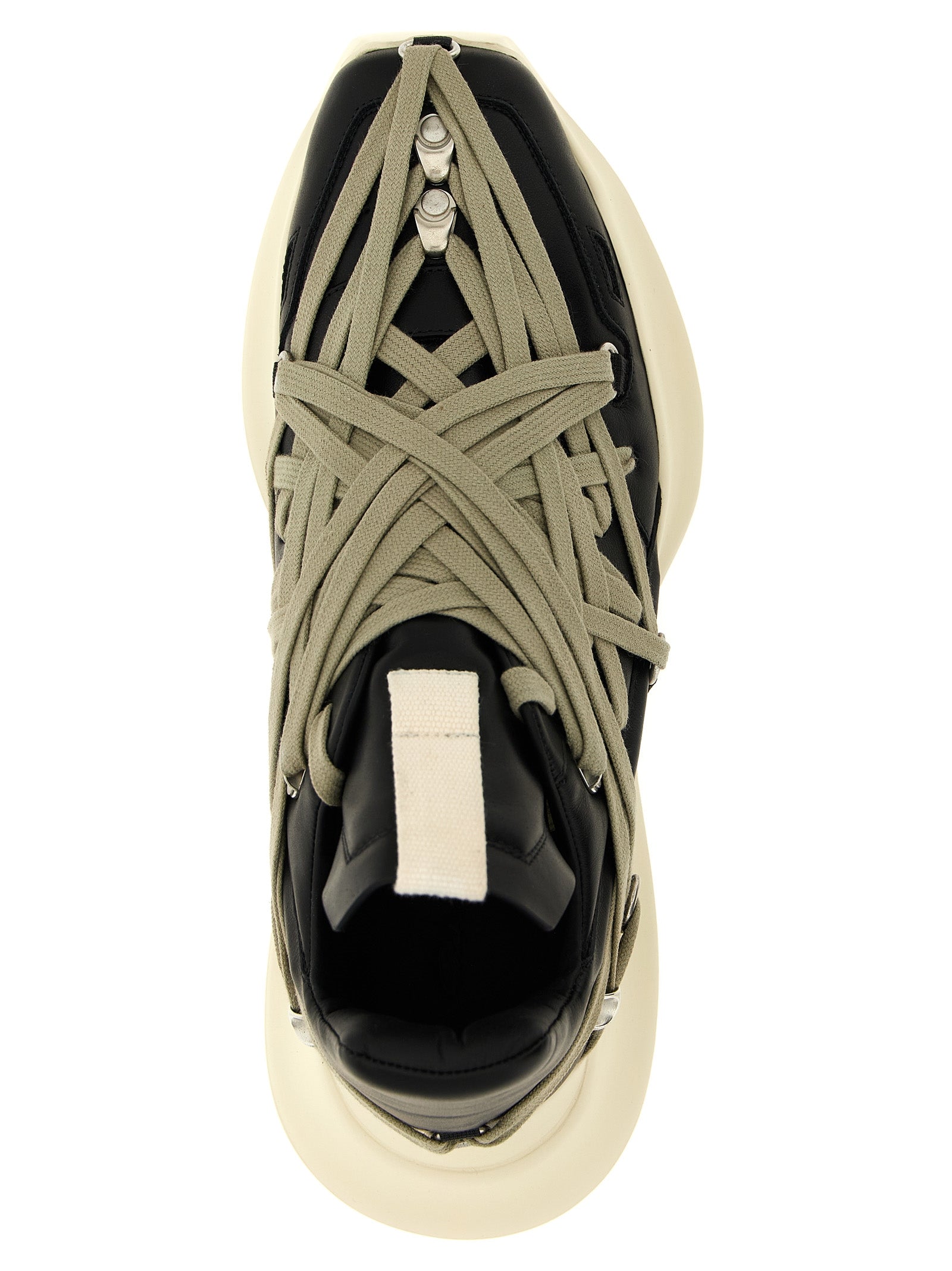 Indulge in the audacious elegance of Rick Owens' 'Megalace Geth Runner' sneakers, crafted from premium calfskin leather, embodying luxury and bold individuality.