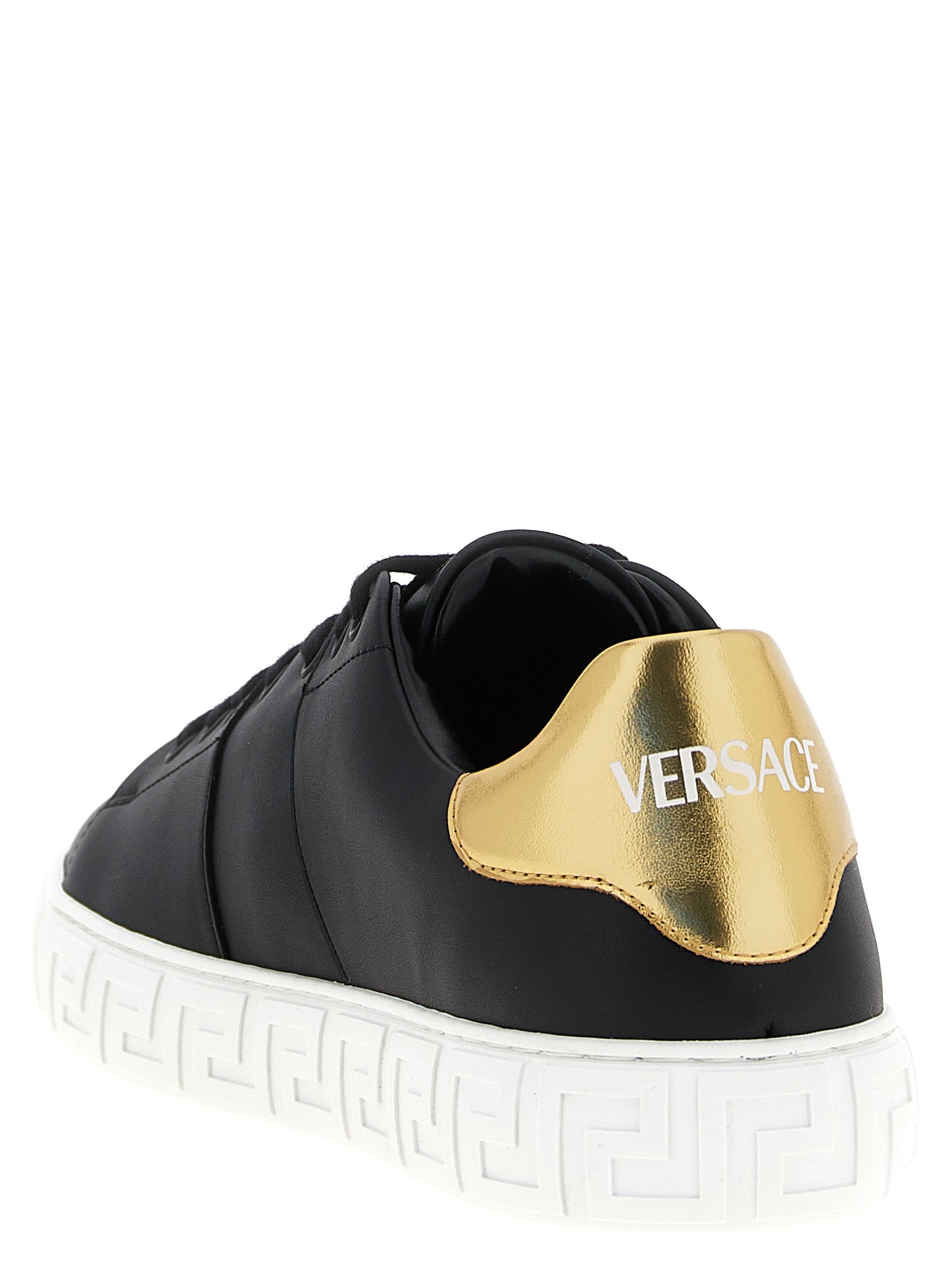 Elevate your style with Versace Black Nylon Low Top Sneakers, a fusion of eco-luxury and timeless elegance, crafted for those who embody sophistication and grace.