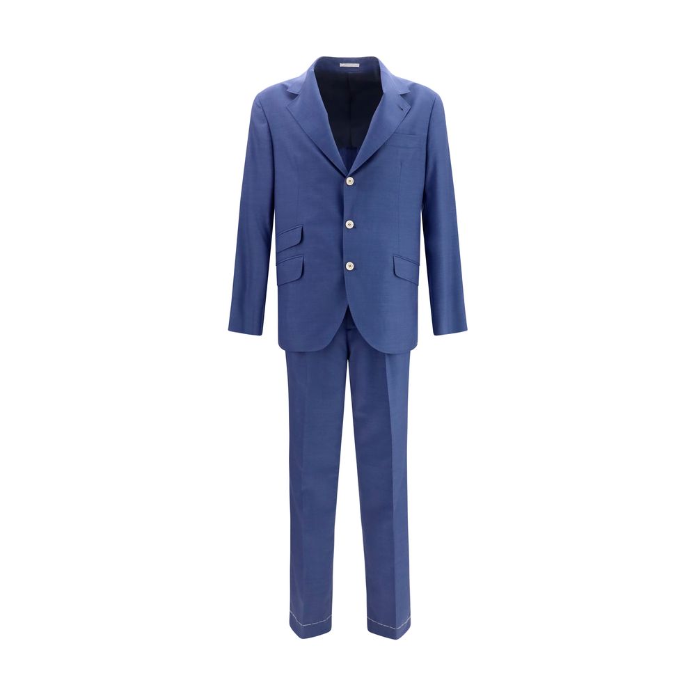 Discover the Brunello Cucinelli Blue Wool Oves Aries Two-Piece Suit, a masterpiece of 100% Fleece Wool Ovis Aries, embodying timeless elegance and refined sophistication for the discerning individual.