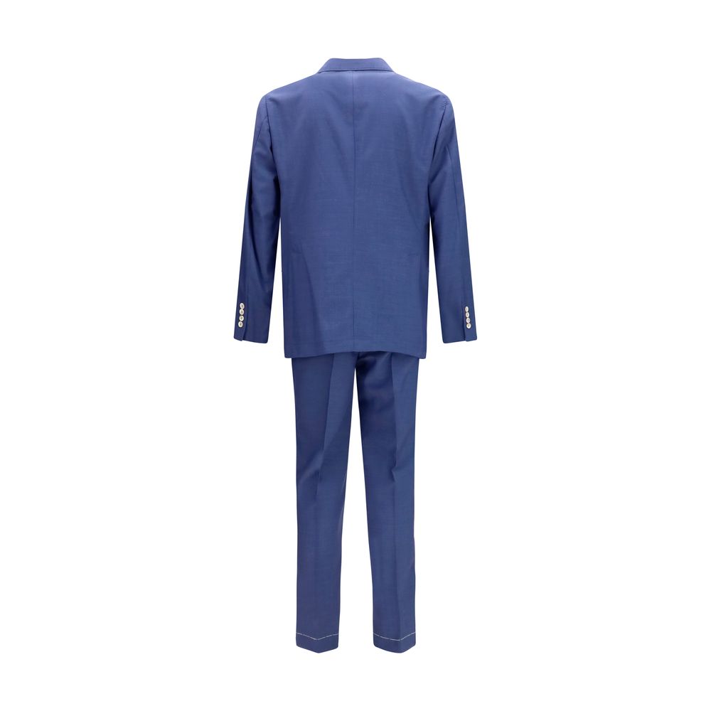 Indulge in the exquisite Brunello Cucinelli Blue Wool Oves Aries Two-Piece Suit, a masterpiece of 100% Fleece Wool Ovis Aries, embodying timeless elegance and refined sophistication.