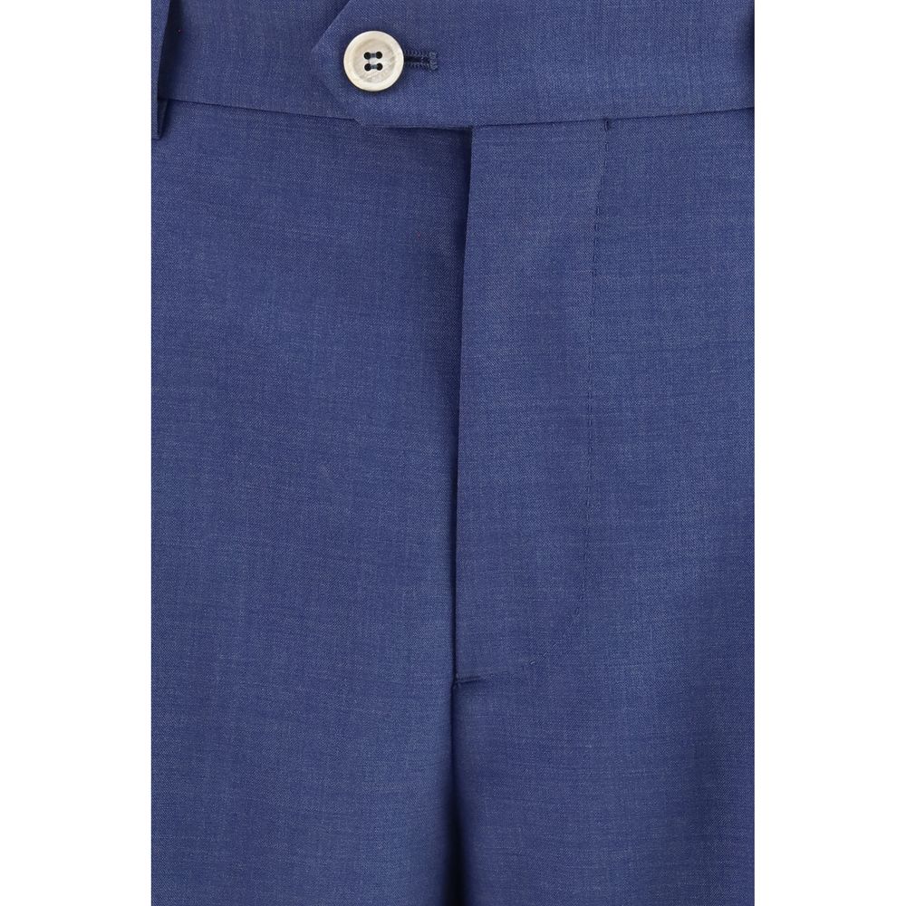 Discover the Brunello Cucinelli Blue Wool Oves Aries Two-Piece Suit, a masterpiece of 100% Fleece Wool Ovis Aries, embodying timeless elegance and refined sophistication.