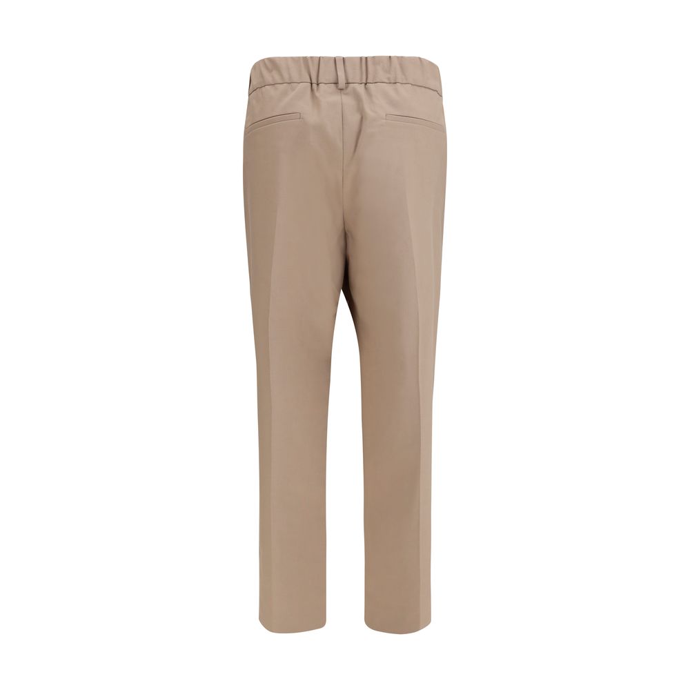 Discover the Brunello Cucinelli Beige Cotton Casual Pants, a blend of luxury and comfort, crafted for timeless elegance and effortless sophistication.