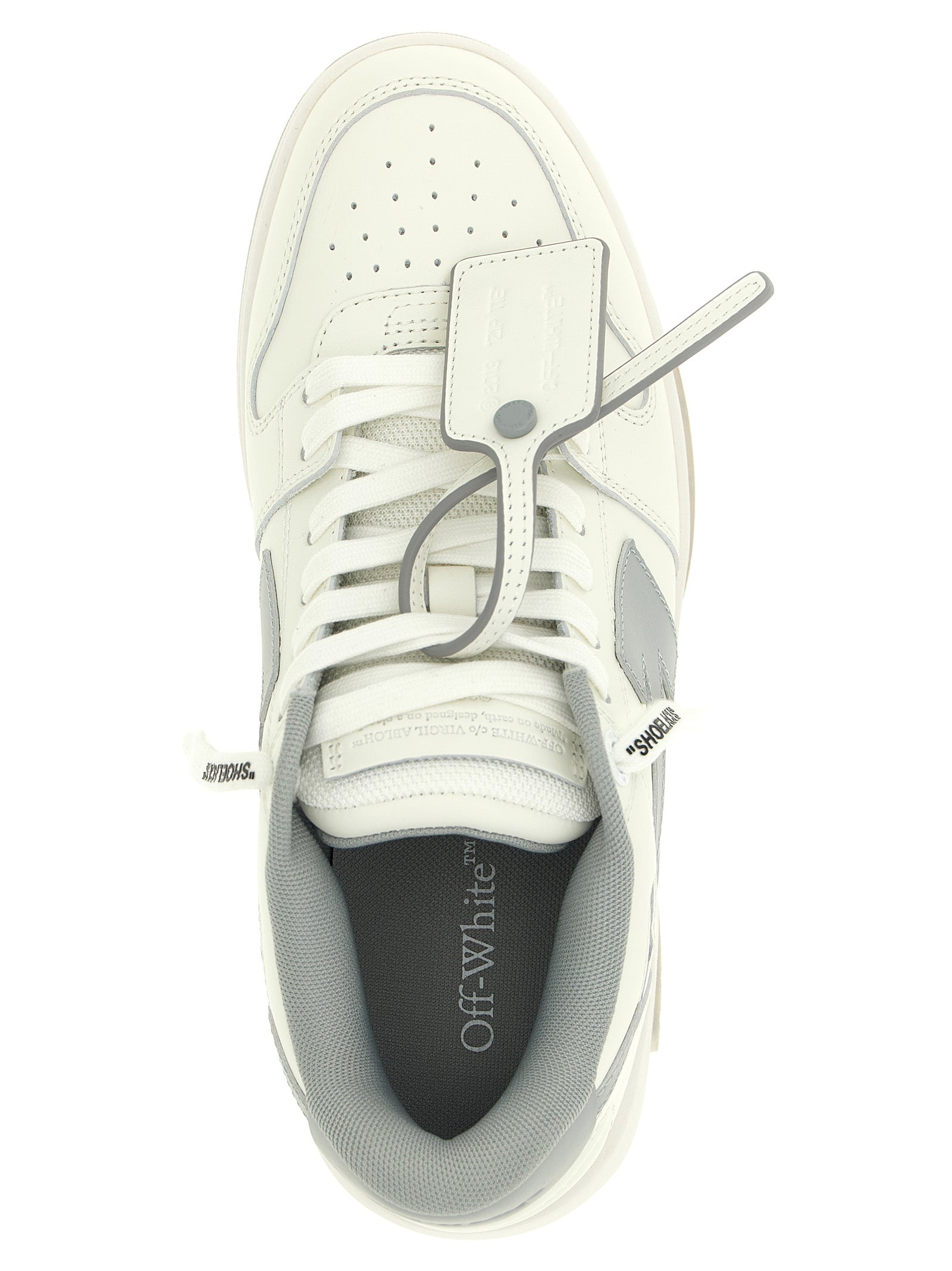 Step into a world of elegance with Off-White Gray Leather Low Top Sneakers, where premium craftsmanship meets contemporary luxury for the discerning individual.