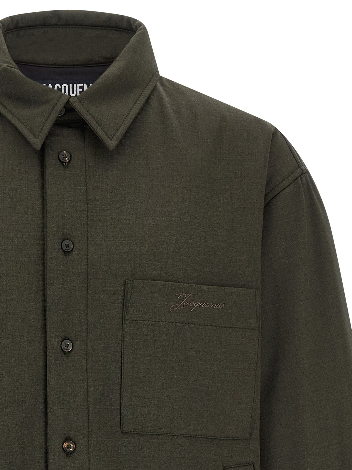 Elevate your wardrobe with the Jacquemus Bicolor Virgin Wool Shell Jacket, a masterpiece of French craftsmanship that exudes contemporary elegance and sophistication.