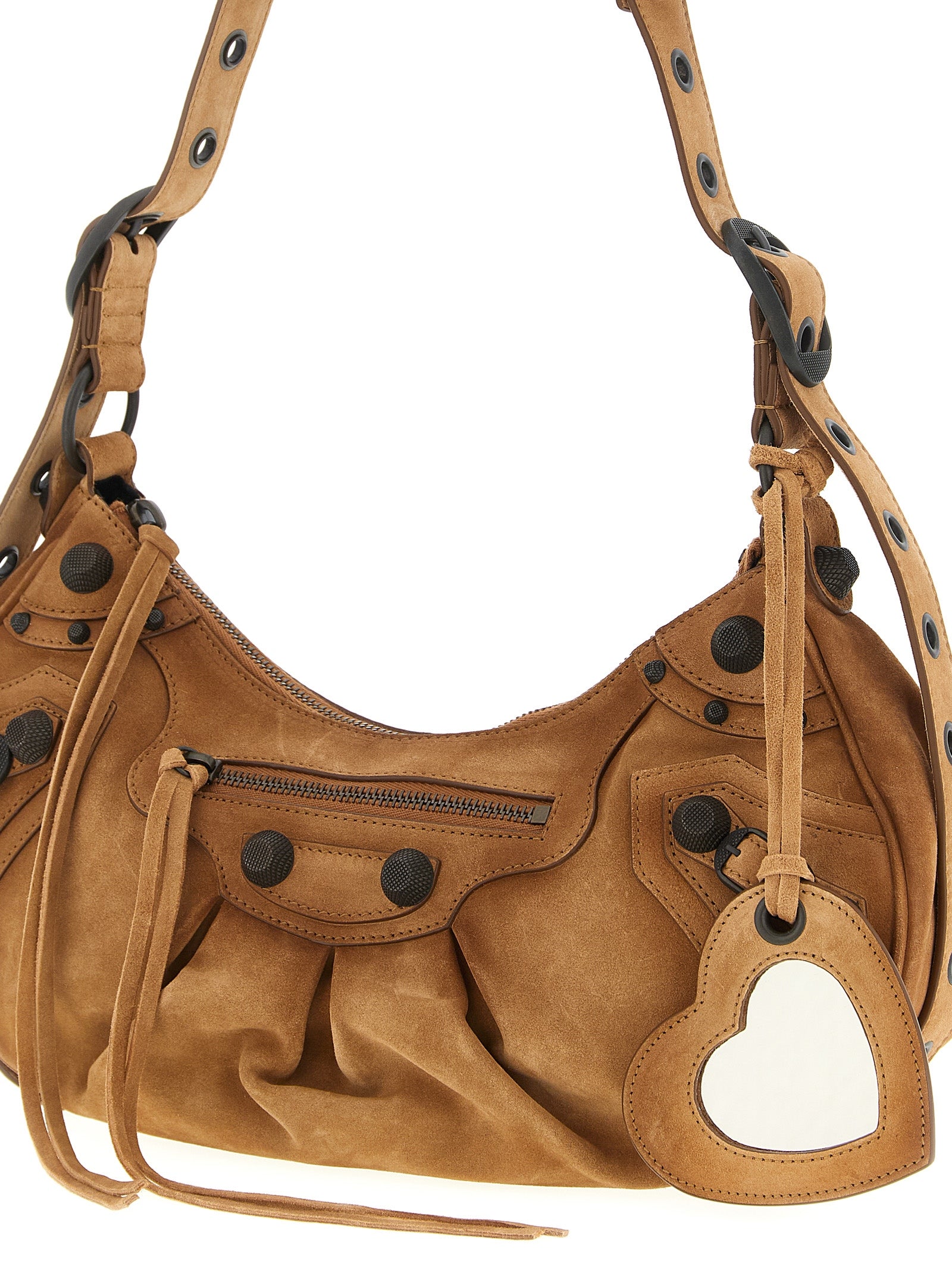 Experience the allure of the Balenciaga Brown Calfskin Shoulder Bag, a masterpiece of Italian craftsmanship in luxurious suede, perfect for the discerning fashion connoisseur.