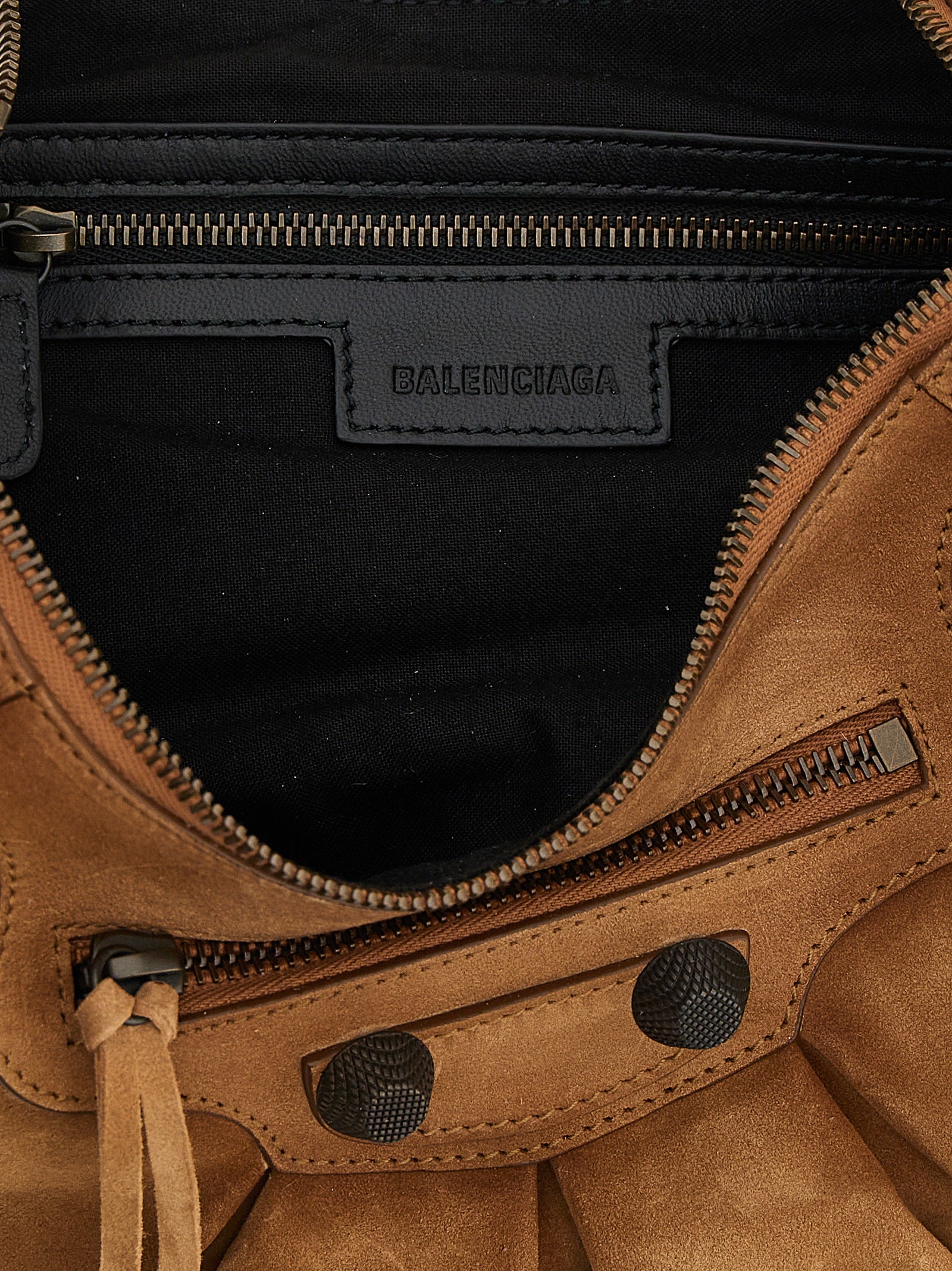 Experience the exquisite allure of the Balenciaga Brown Calfskin Shoulder Bag, a masterpiece of luxury craftsmanship, perfect for elevating any ensemble with timeless elegance.