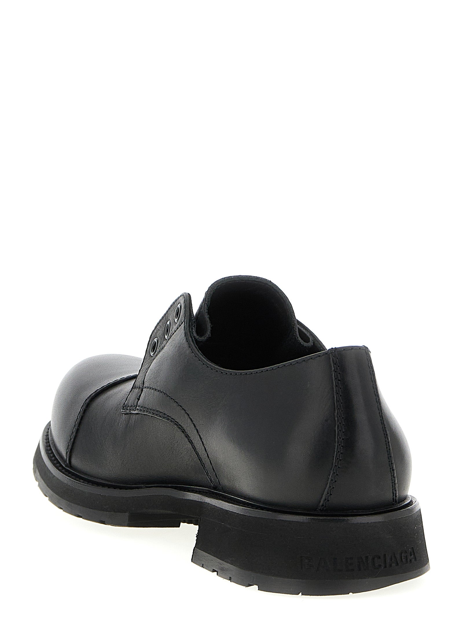 Indulge in the exquisite Balenciaga Black Bull Skin Slip-On Loafers, crafted from 100% premium bull leather in Italy, where luxury meets timeless elegance.