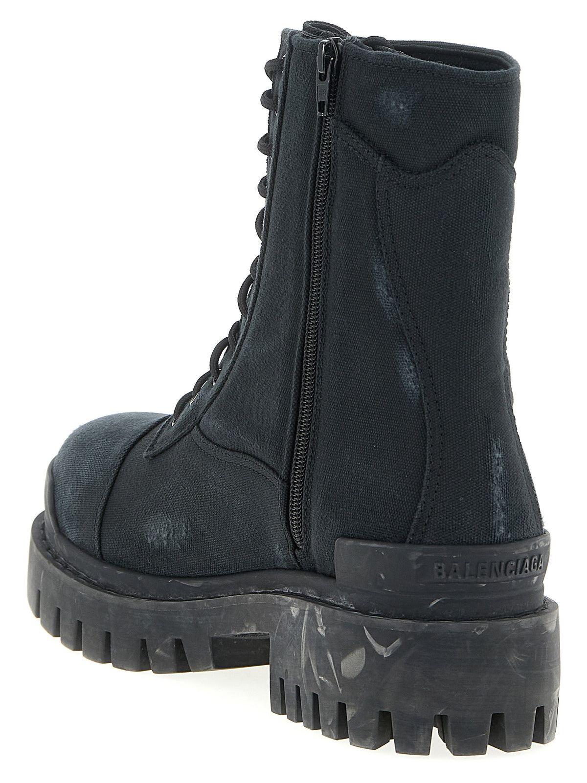 Step into a realm of elegance with Balenciaga's Black Cotton Chelsea Boots, crafted from luxurious cotton canvas, embodying sophistication and modern design for the discerning individual.