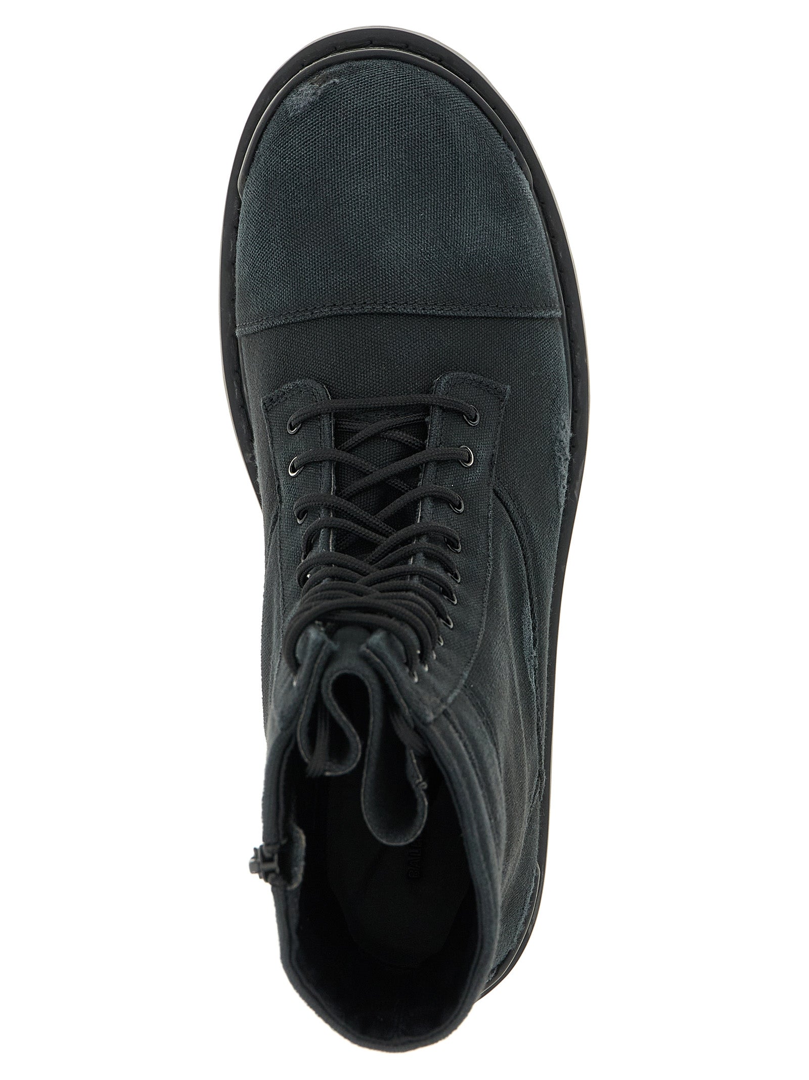 Discover the Balenciaga Black Cotton Chelsea Boots, a luxurious blend of avant-garde design and exquisite craftsmanship, perfect for those who embody elegance and confidence.