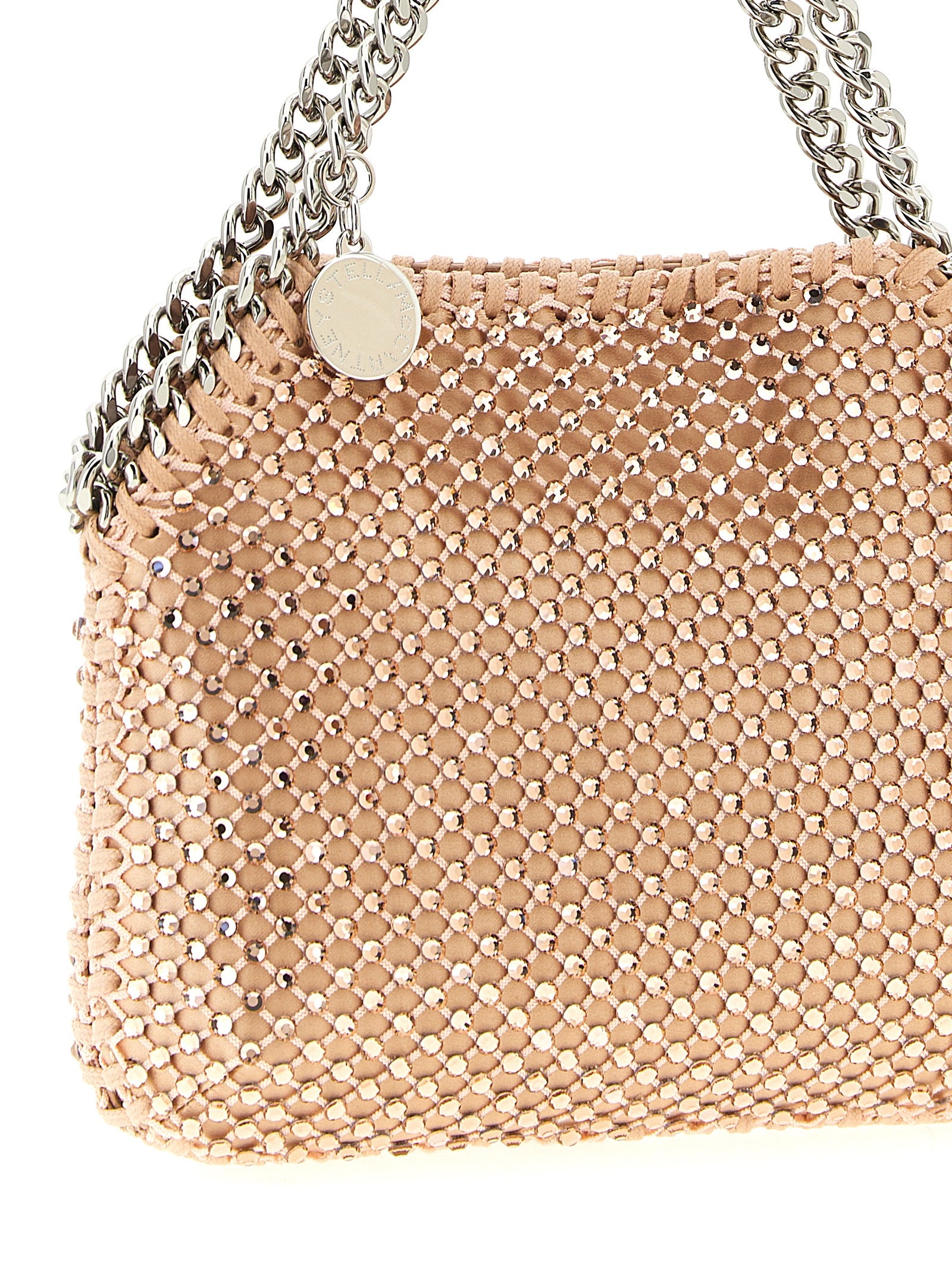 Discover the Stella McCartney Multicolor Polyamide Handbag from the Falabella Nano collection, where sustainable luxury meets exquisite craftsmanship in a captivating pink design.