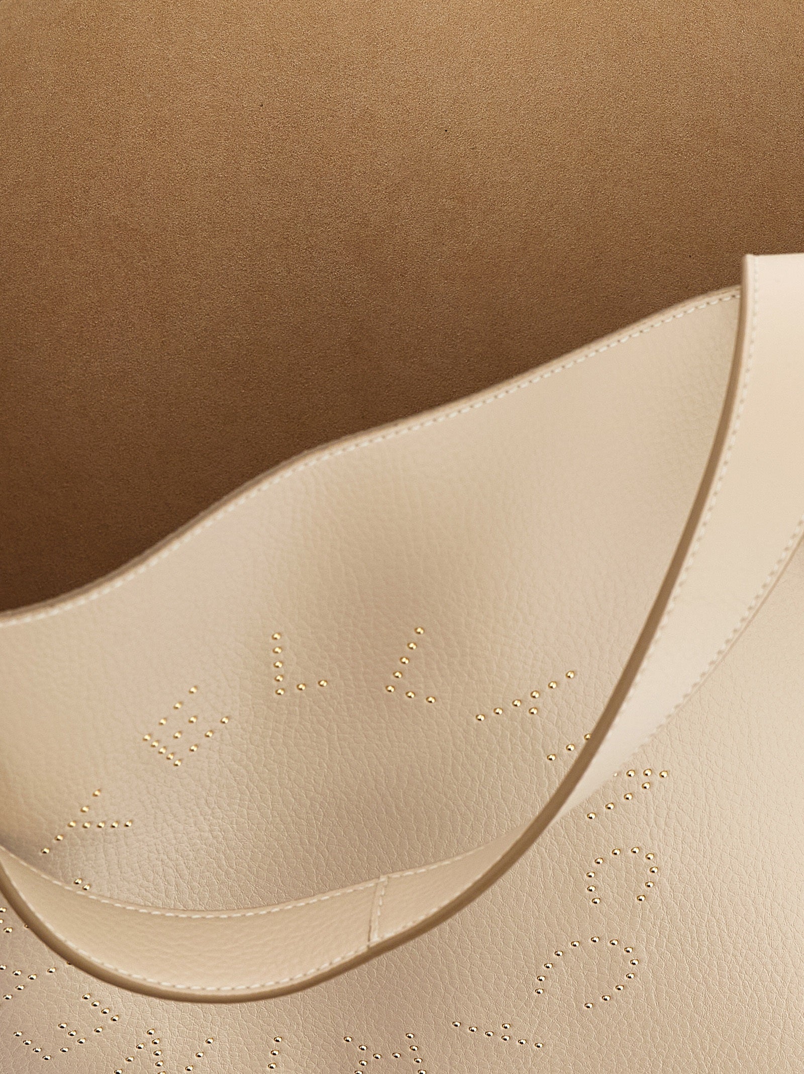 Indulge in the exquisite Stella McCartney Beige Polyamide Tote Bag, crafted from premium fabric, merging timeless elegance with modern functionality for the discerning individual.