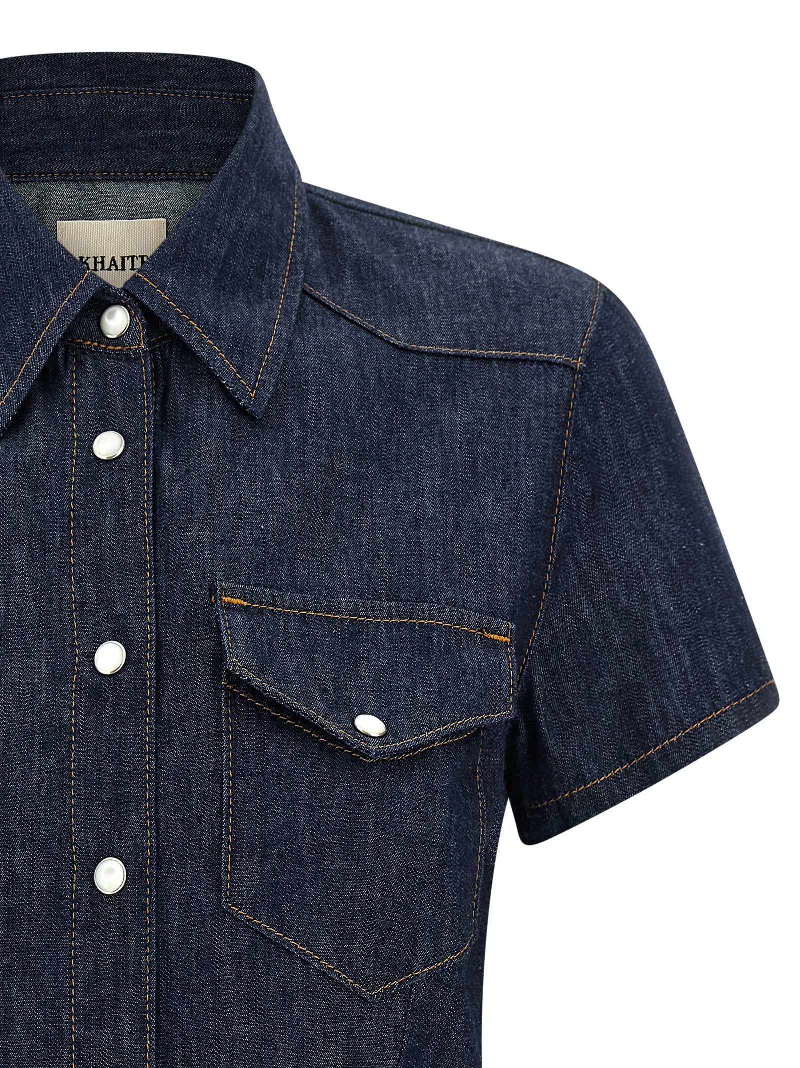 Indulge in the KHAITE Blue Cotton Blouse, a masterpiece of premium craftsmanship that embodies effortless sophistication and timeless elegance for every occasion.