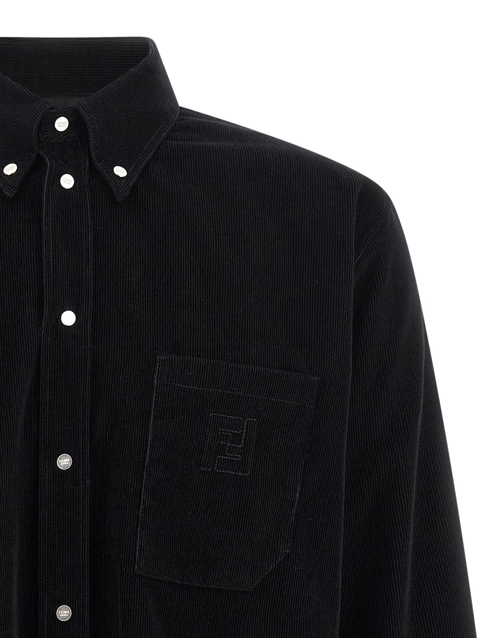 Elevate your wardrobe with the Fendi Black Cotton Blouse, a luxurious blend of Italian craftsmanship and timeless elegance, perfect for any sophisticated occasion.