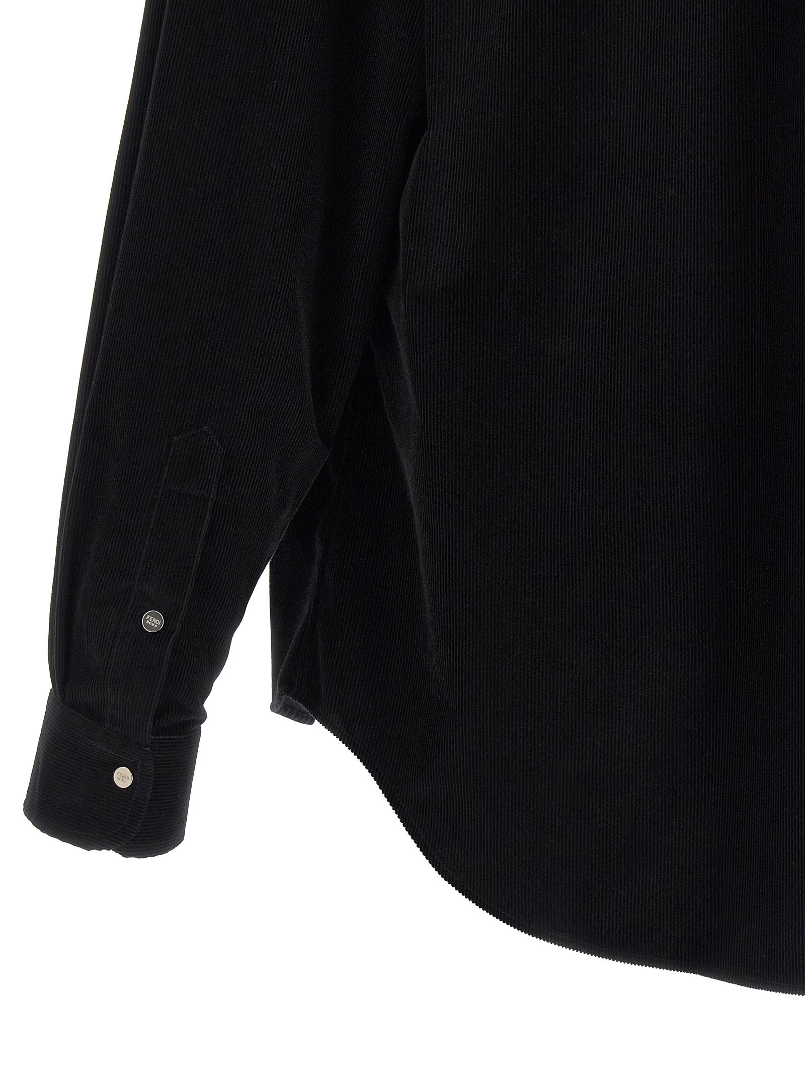 Elevate your wardrobe with the Fendi Black Cotton Blouse, a luxurious blend of Italian craftsmanship and timeless elegance, perfect for sophisticated style.