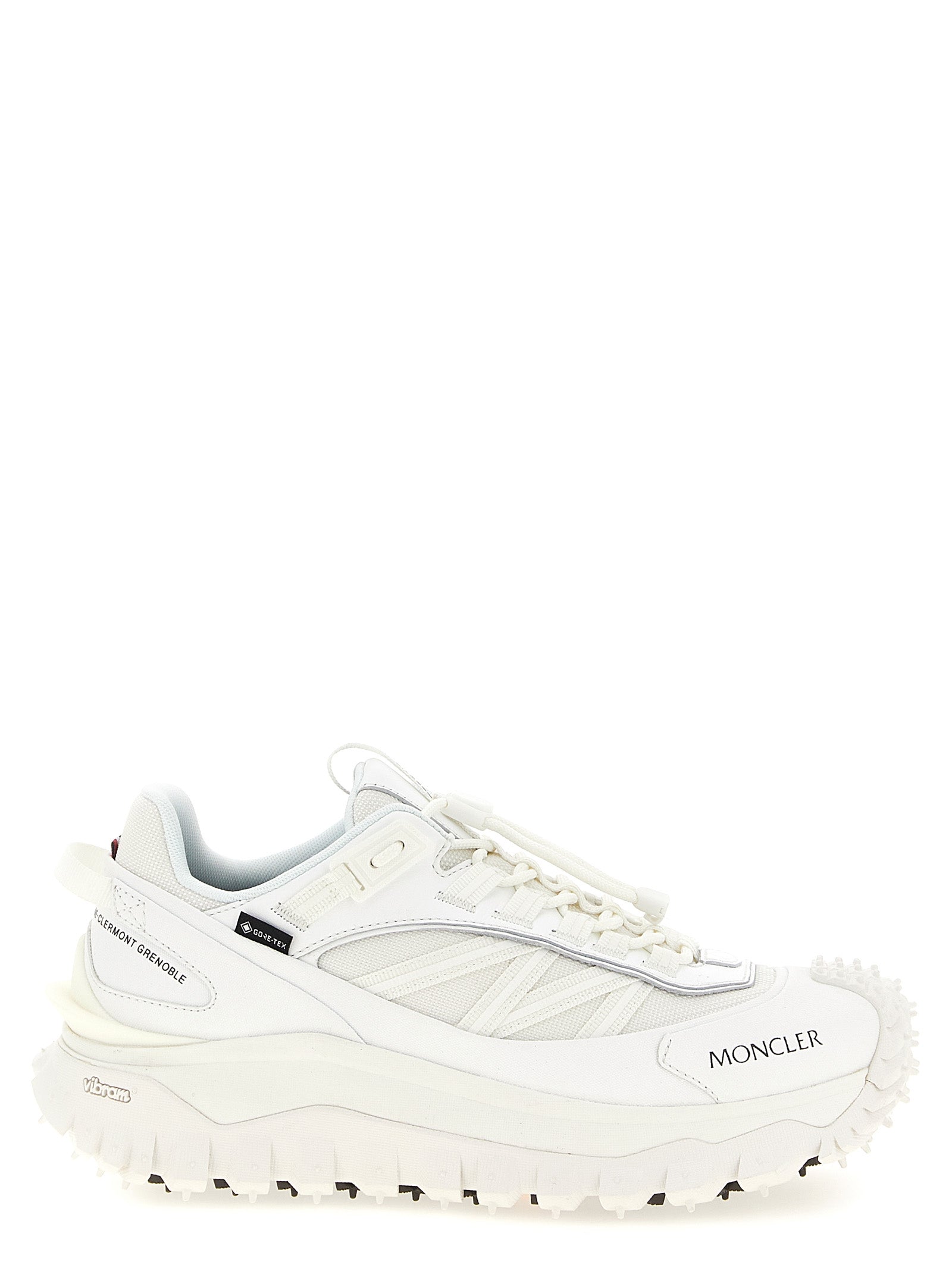 Discover the Moncler Trailgrip GTX sneakers, crafted from premium materials for unparalleled luxury and comfort, designed for those who embrace adventure with elegance.