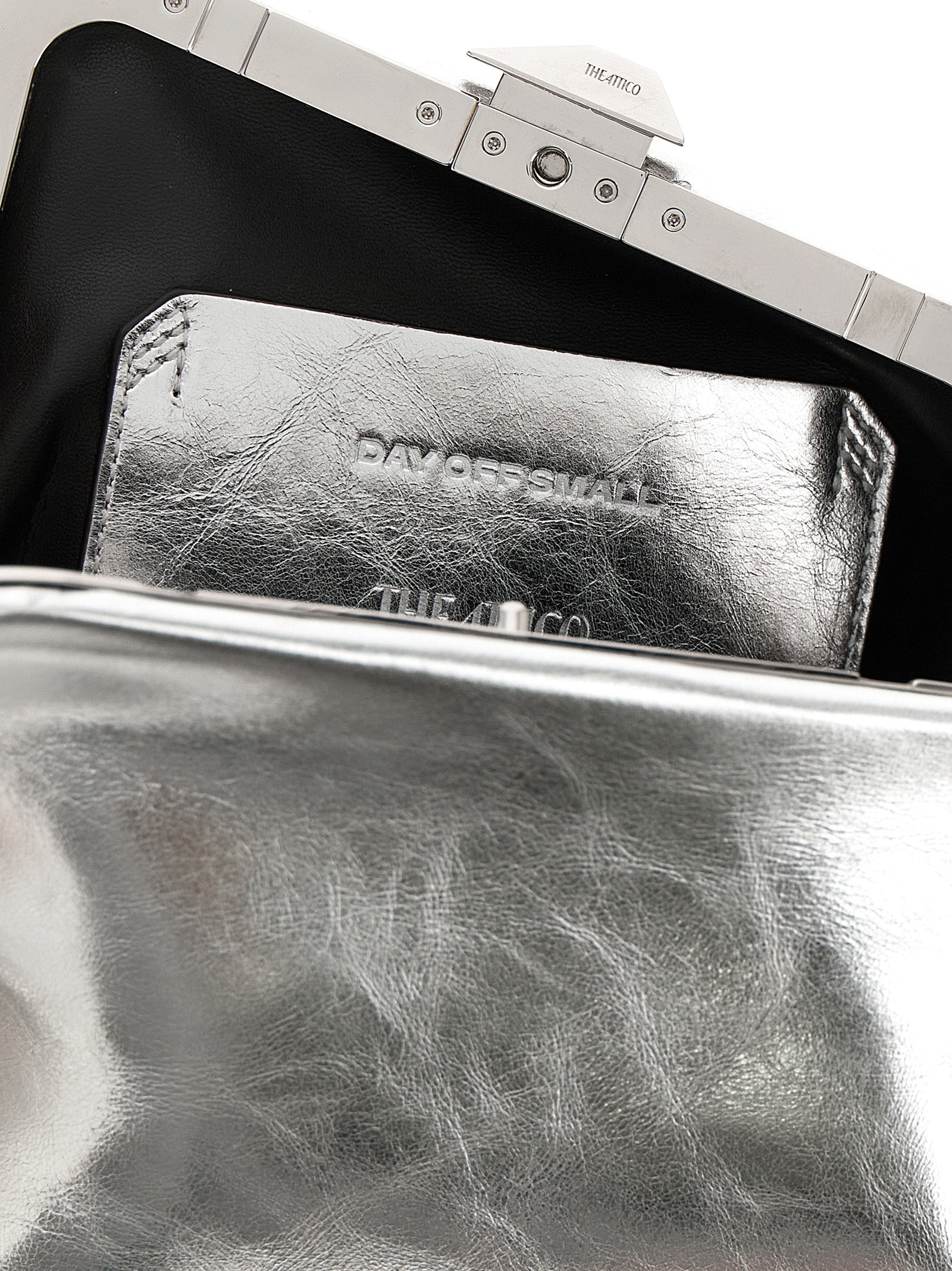 Elevate your elegance with The Attico Silver Calfskin Clutch Bag from the Day Off Small collection, a luxurious blend of Italian craftsmanship and modern sophistication.