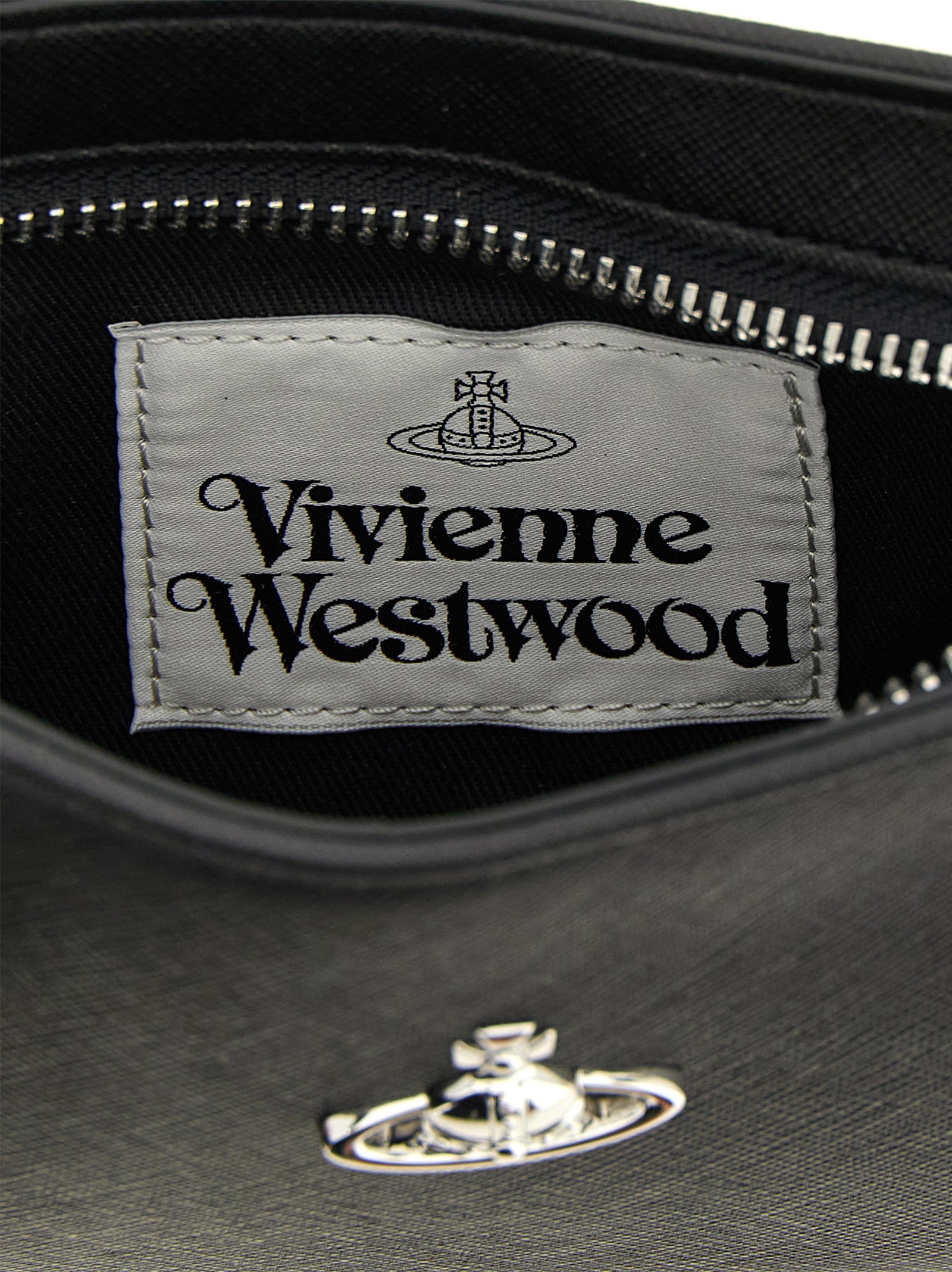 Elevate your style with the Vivienne Westwood Black Polyethylene Shoulder Bag, a luxurious Italian-crafted accessory that embodies timeless elegance and sophisticated design.