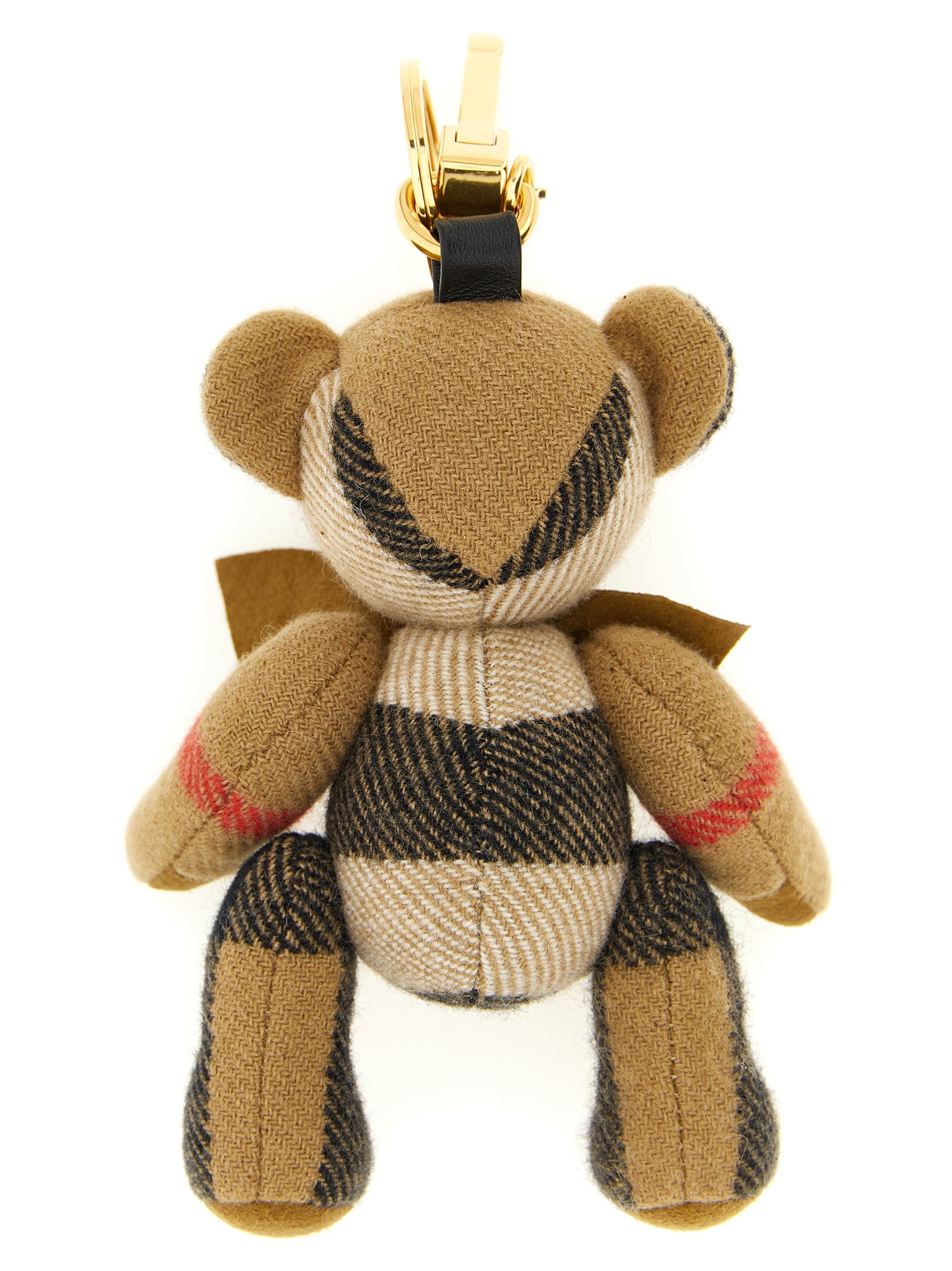 Elevate your style with the Burberry Beige Cashmere Keychain, an exquisite blend of luxury and whimsy, crafted from 100% cashmere for timeless elegance.