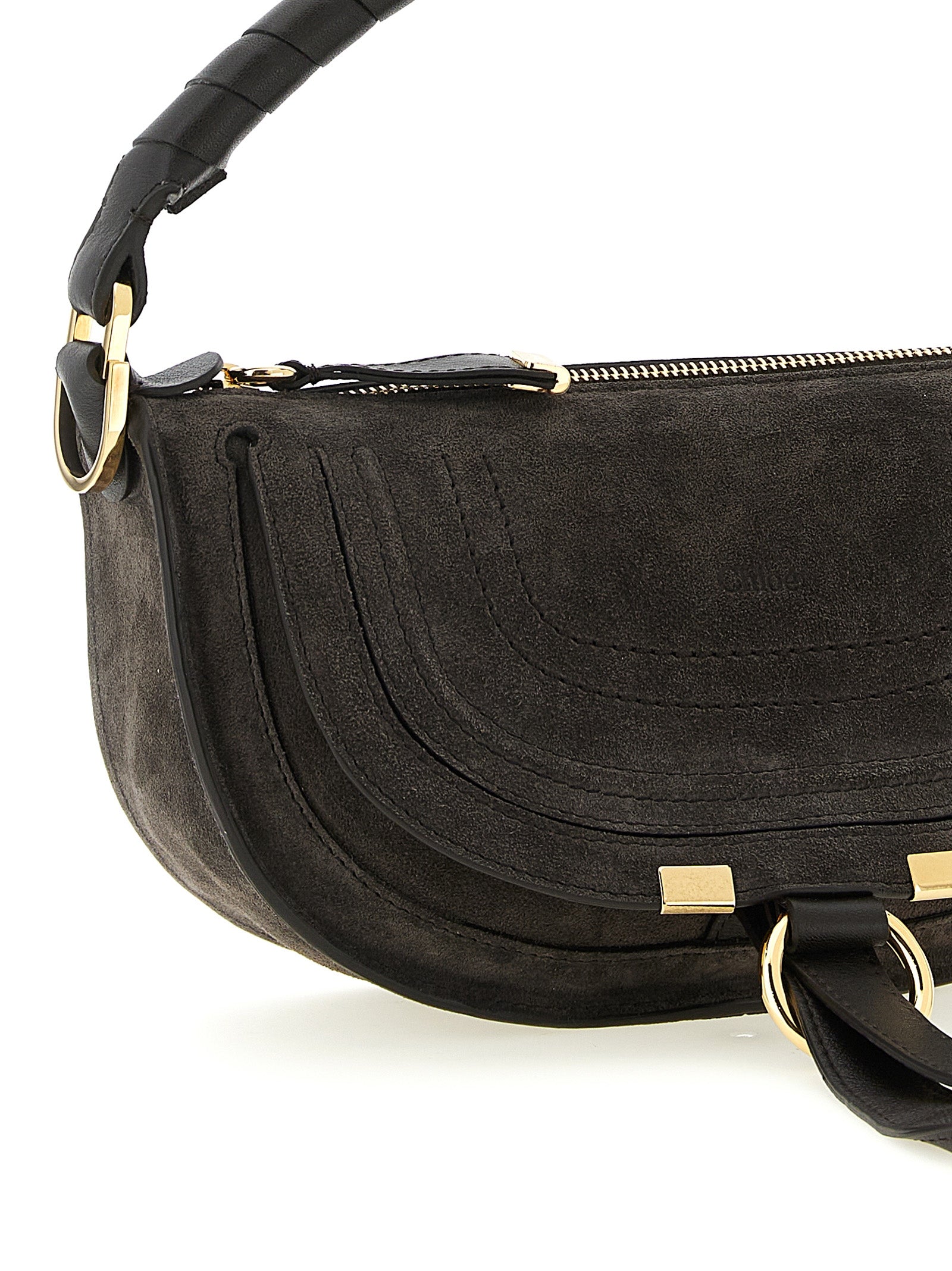 Indulge in the Chloé Brown Calfskin Shoulder Bag, a masterpiece of sustainable luxury crafted in Italy, embodying timeless elegance for the discerning individual.