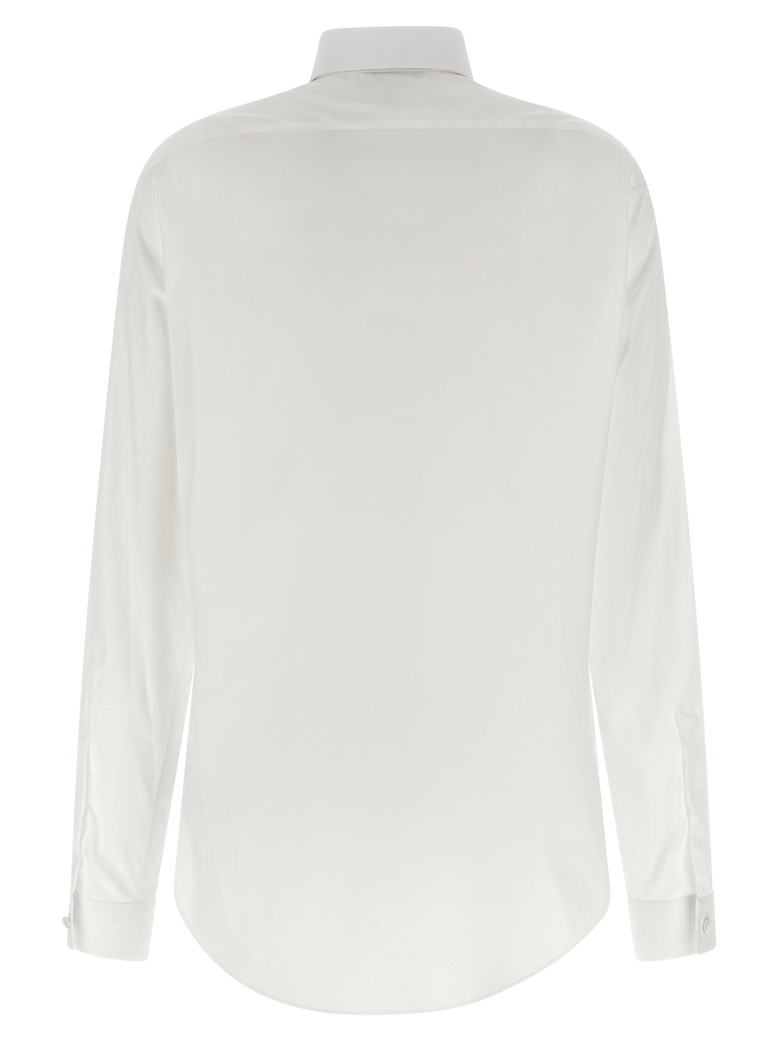 Discover the Tom Ford White Cotton Blouse, a masterpiece of exquisite craftsmanship in luxurious cotton, embodying timeless elegance for the discerning individual.