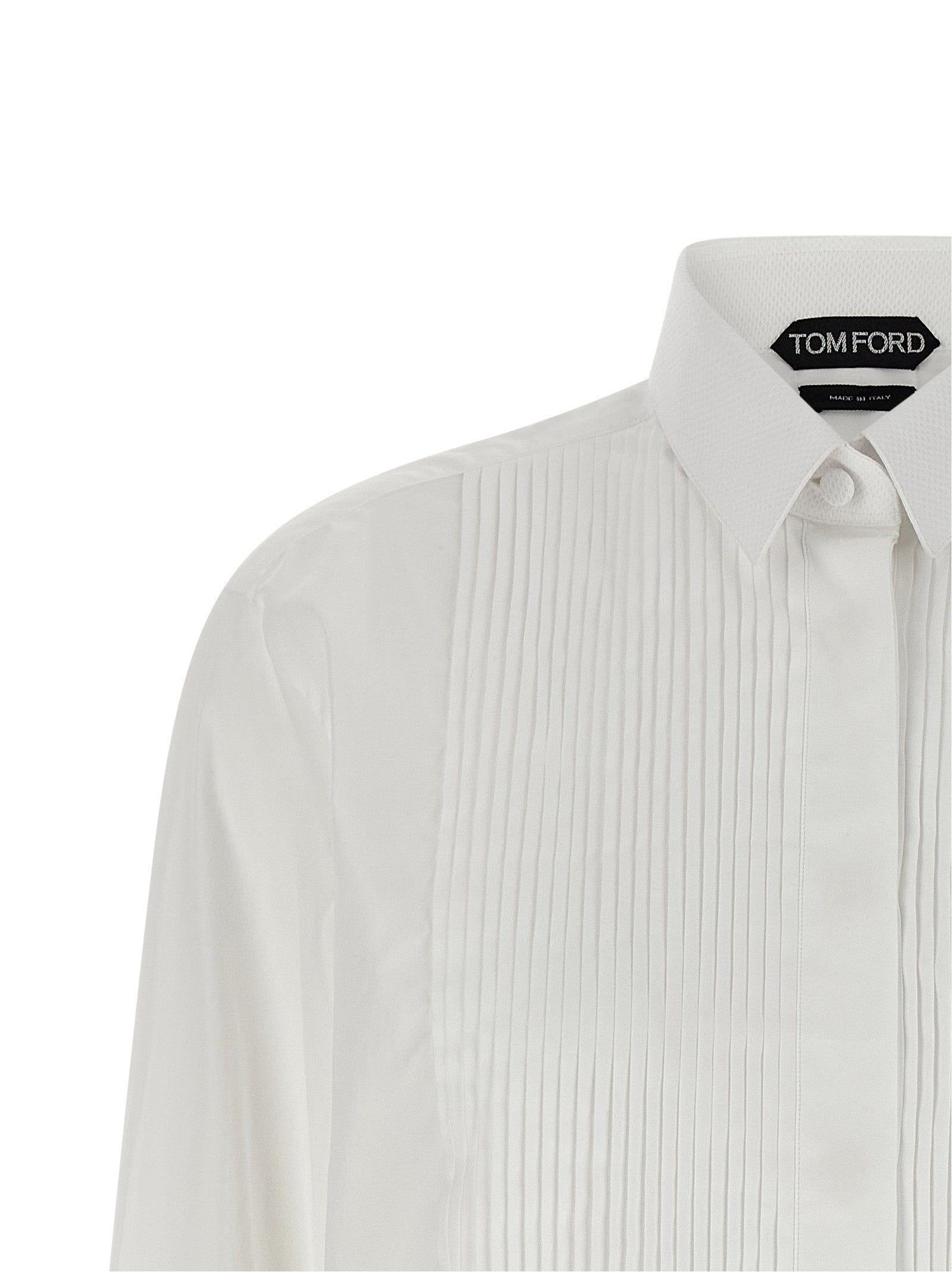 Elevate your wardrobe with the Tom Ford White Cotton Blouse, a masterpiece of exquisite craftsmanship and timeless elegance, perfect for any refined occasion.