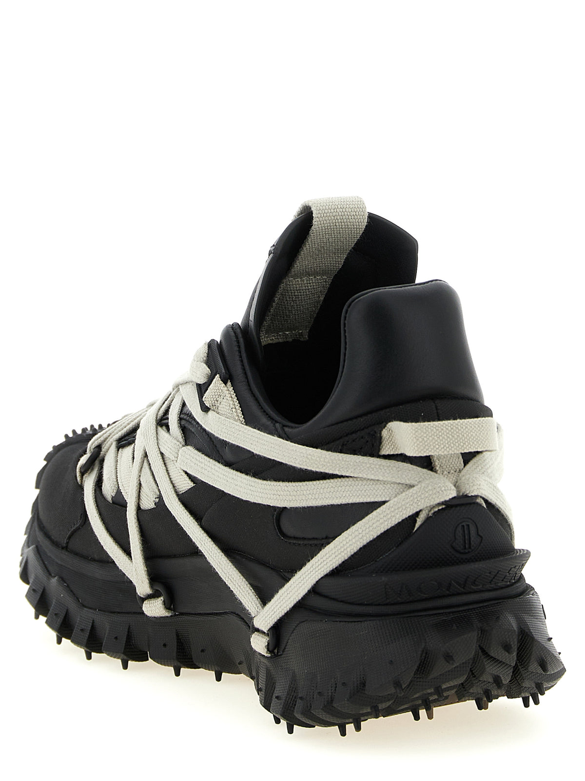 Experience the pinnacle of luxury with Rick Owens Black Cowhide Athletic Sneakers, where avant-garde design meets exquisite craftsmanship for the discerning individual.