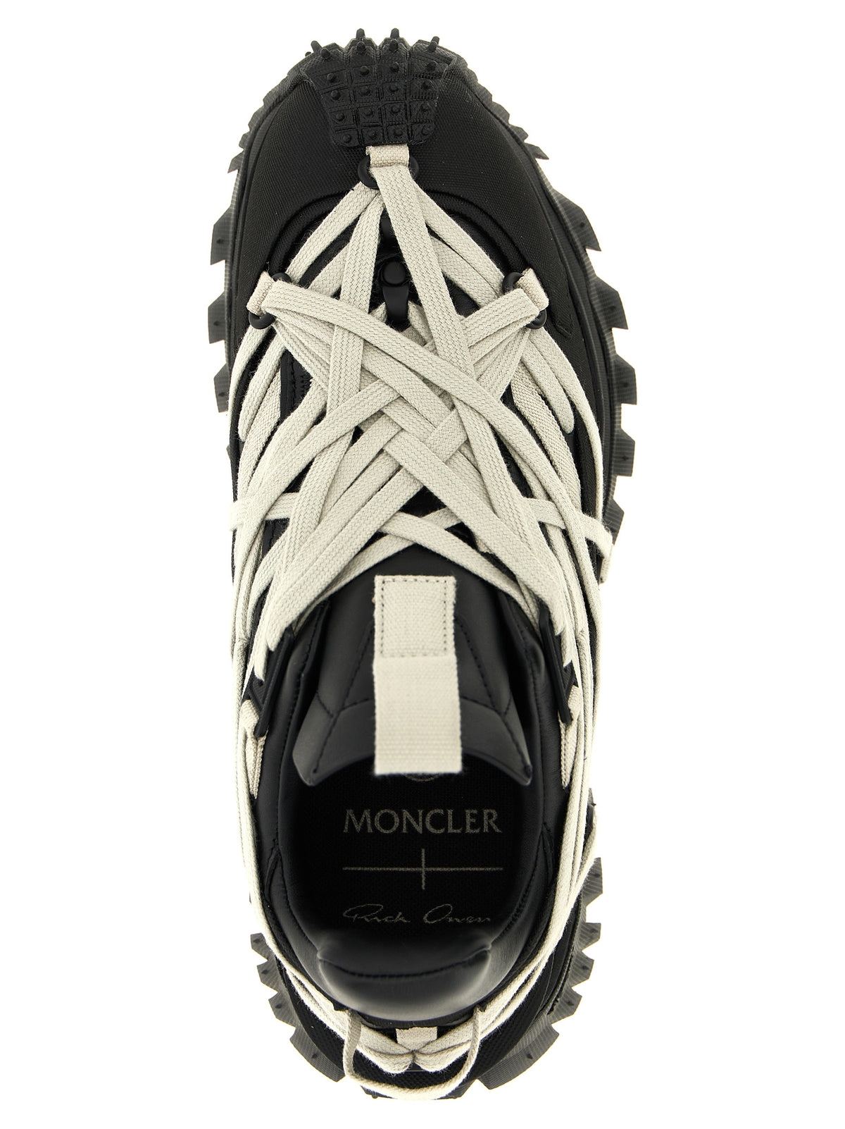 Experience the exquisite allure of Rick Owens Black Cowhide Athletic Sneakers, where luxurious cow leather meets avant-garde design, perfect for the discerning individual.