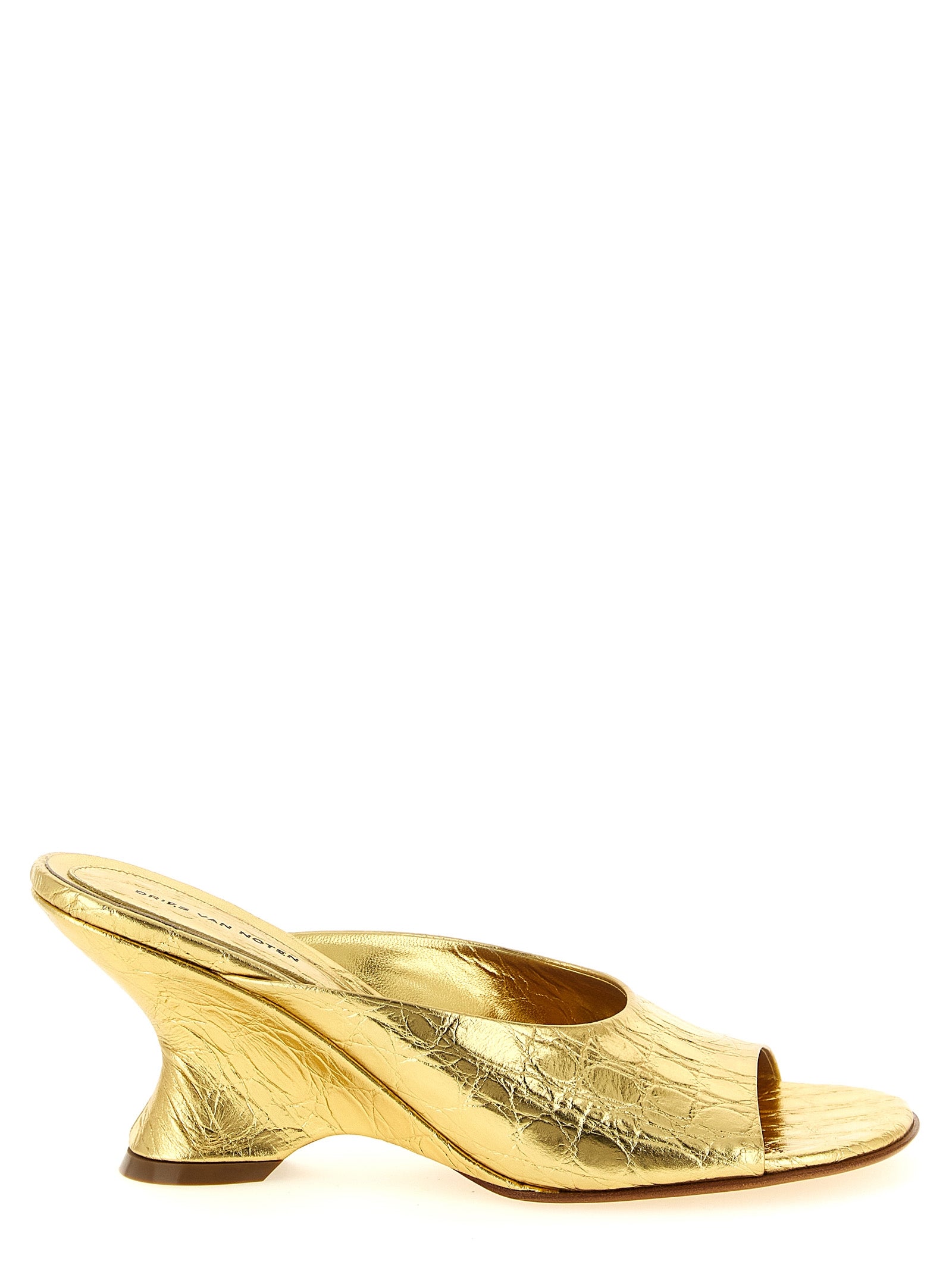 Step into elegance with Dries Van Noten Gold Calfskin Wedge Sandals, crafted from luxurious calfskin leather in Italy, embodying sophistication and timeless allure.