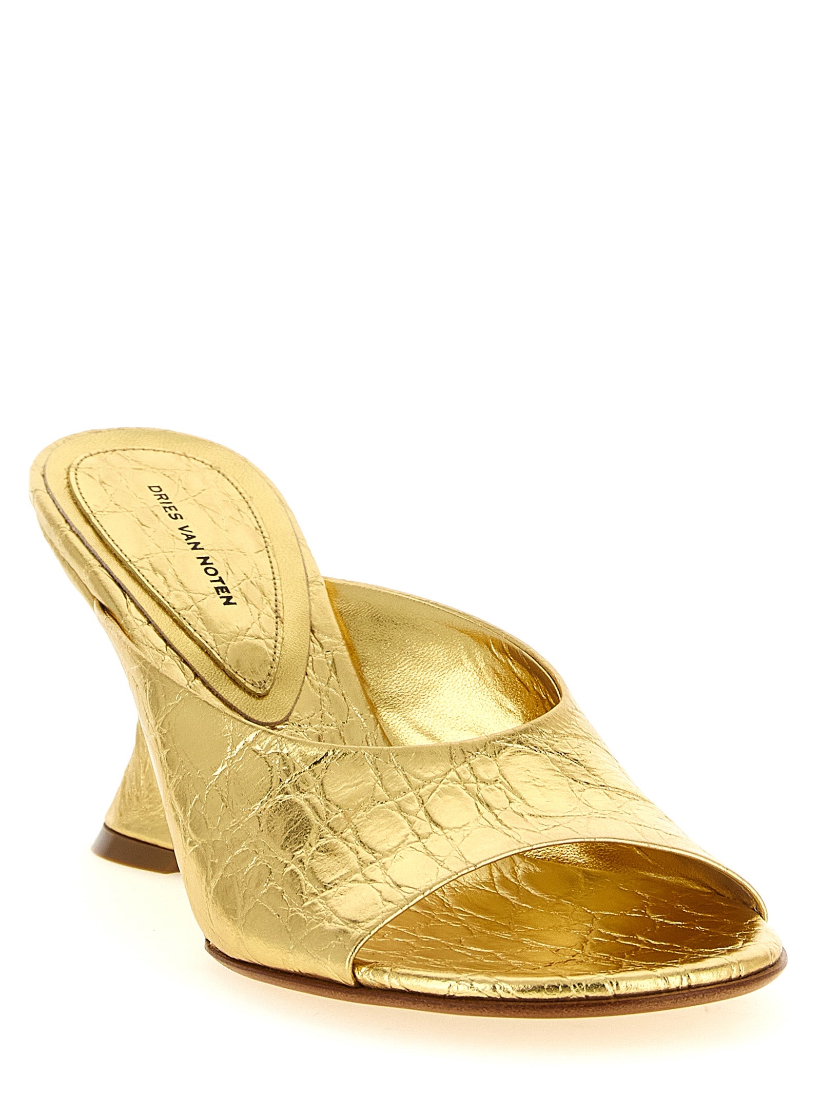 Step into a world of opulence with Dries Van Noten Gold Calfskin Wedge Sandals, crafted from luxurious calfskin leather, embodying elegance and artistry for the discerning individual.