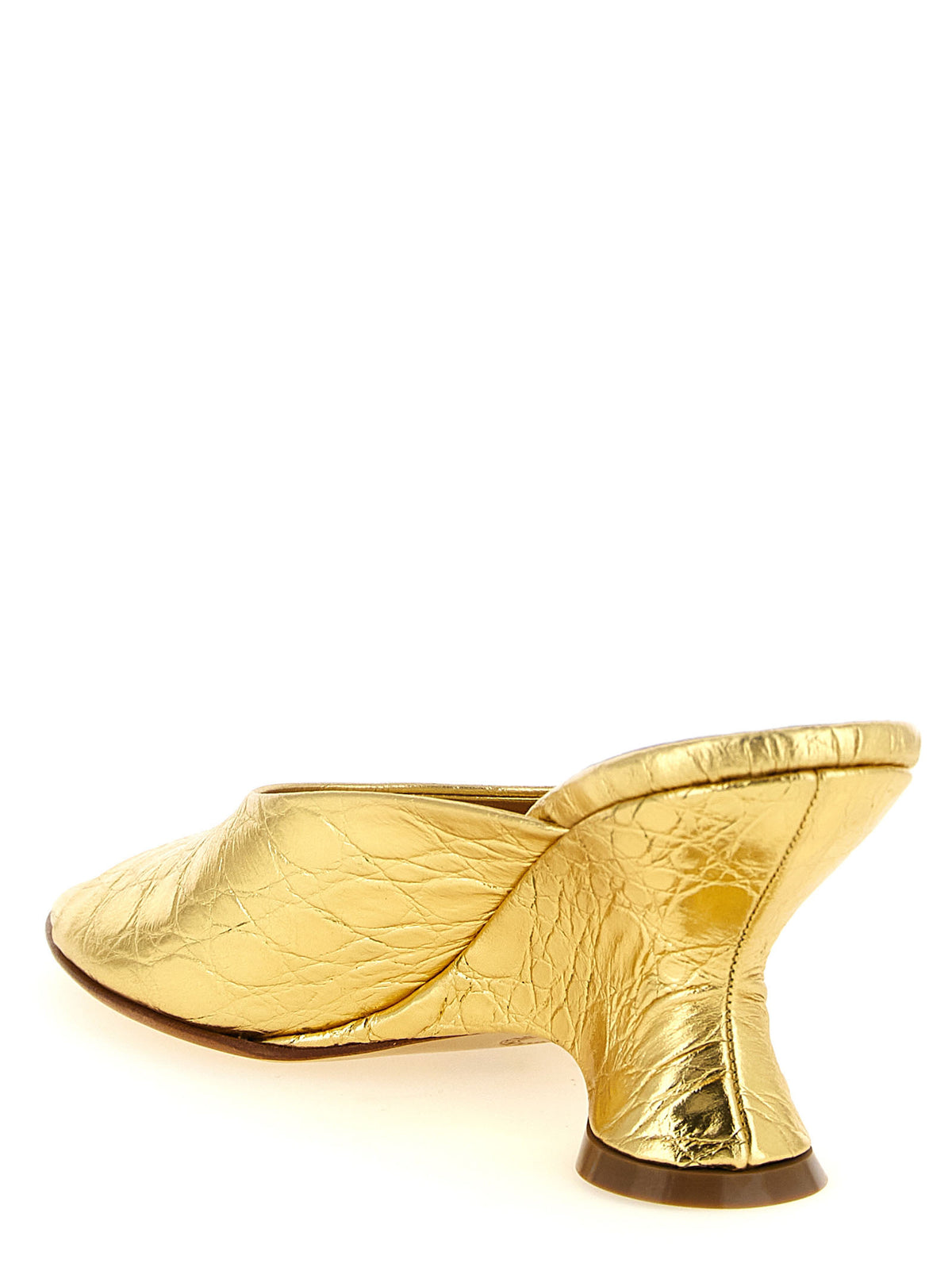 Step into a world of elegance with Dries Van Noten Gold Calfskin Wedge Sandals, crafted from luxurious calfskin leather, embodying sophistication and timeless allure.