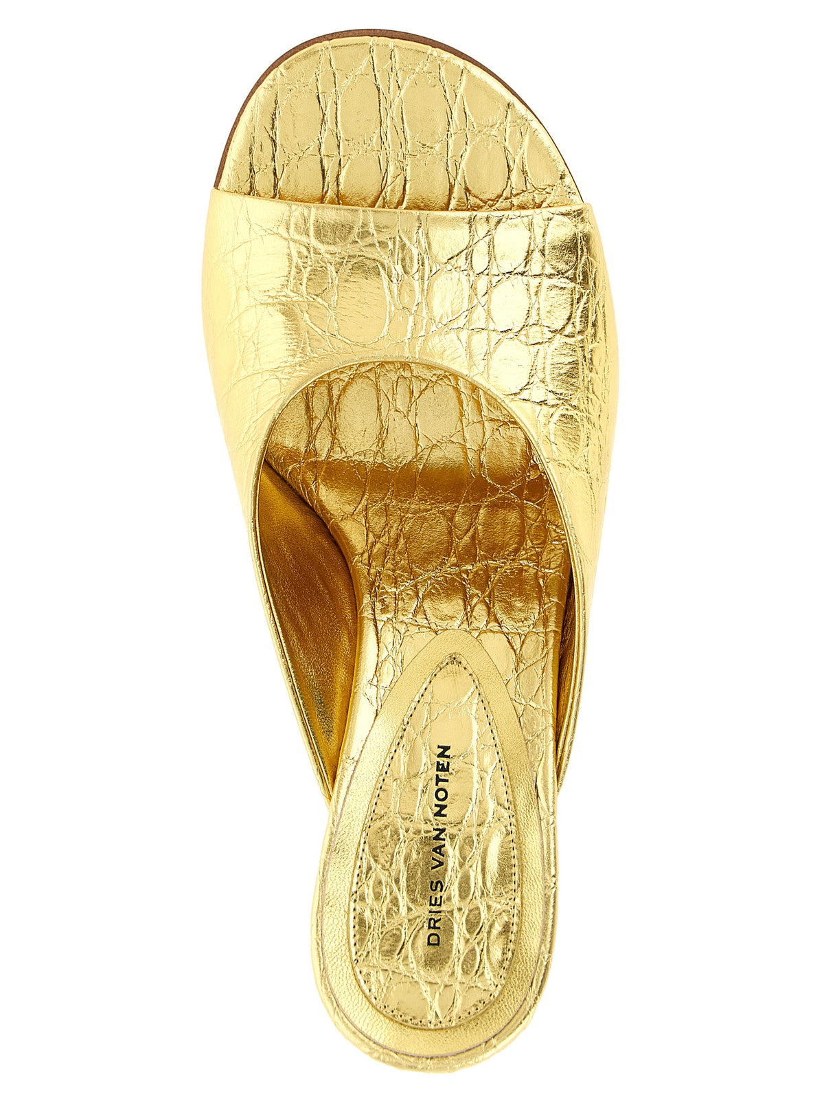 Step into the allure of Dries Van Noten Gold Calfskin Wedge Sandals, where exquisite calfskin craftsmanship meets timeless elegance, perfect for the discerning fashion connoisseur.