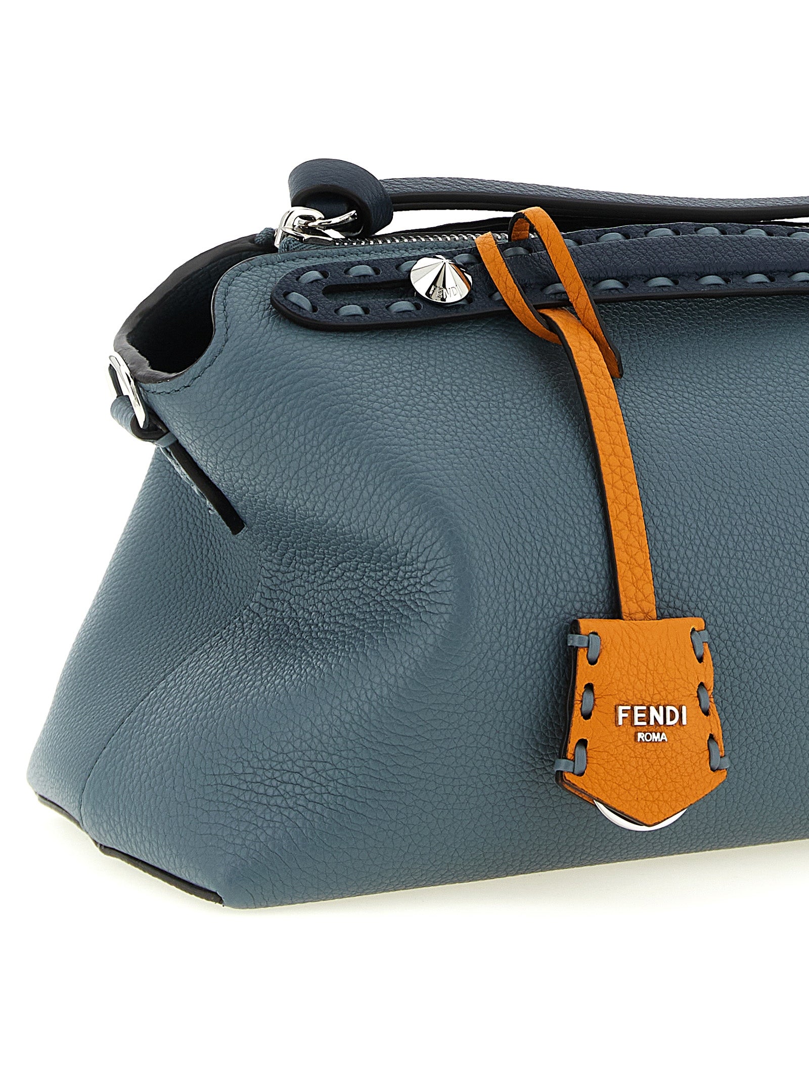 Discover the Fendi Blue Calfskin Handbag, a masterpiece of artisanal craftsmanship in luxurious calfskin leather, perfect for elevating your style with timeless elegance.