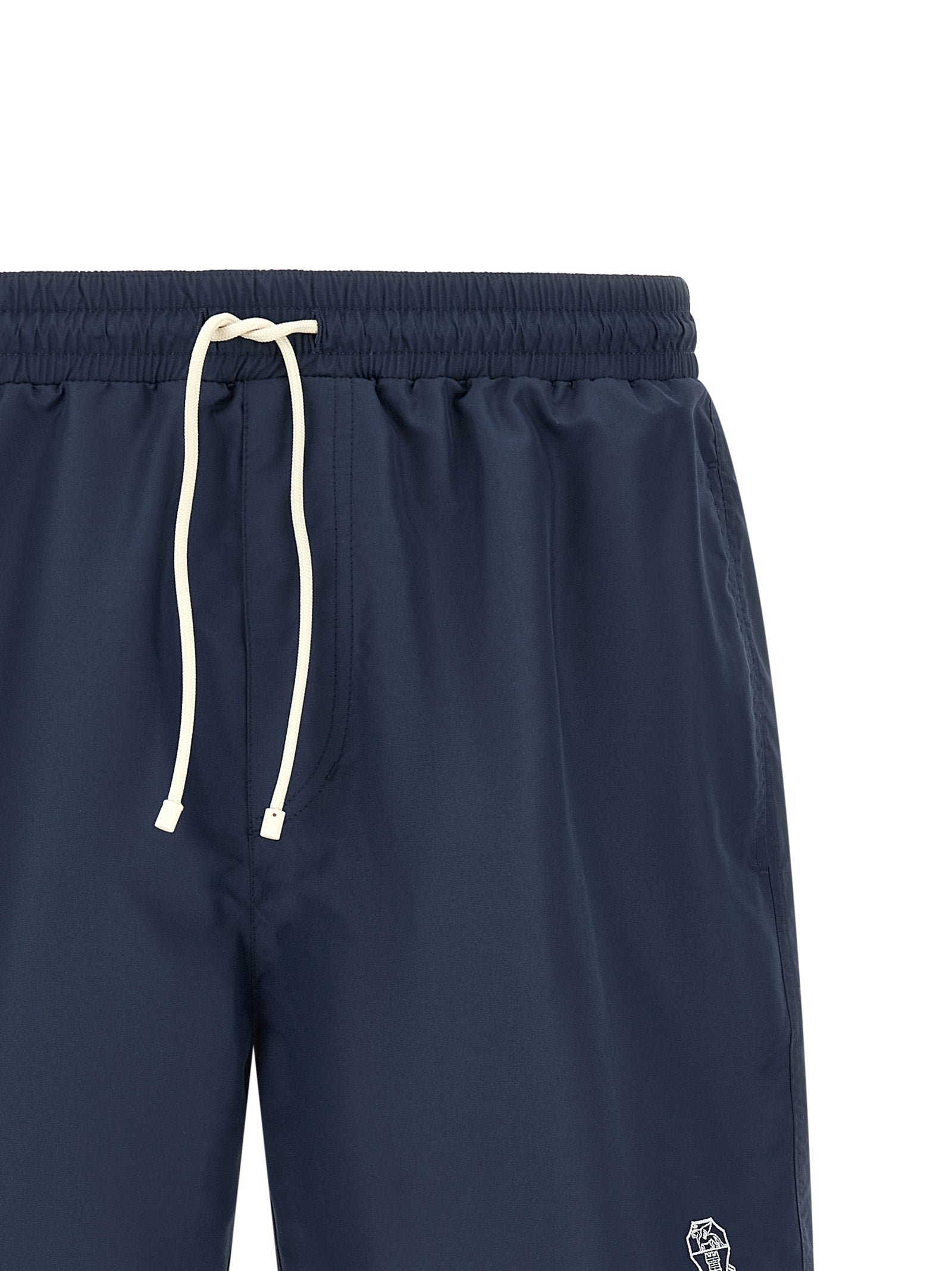 Elevate your summer style with Brunello Cucinelli's luxurious Blue Polyester Swim Shorts, crafted in Italy for the discerning individual who values timeless elegance and sophisticated design.