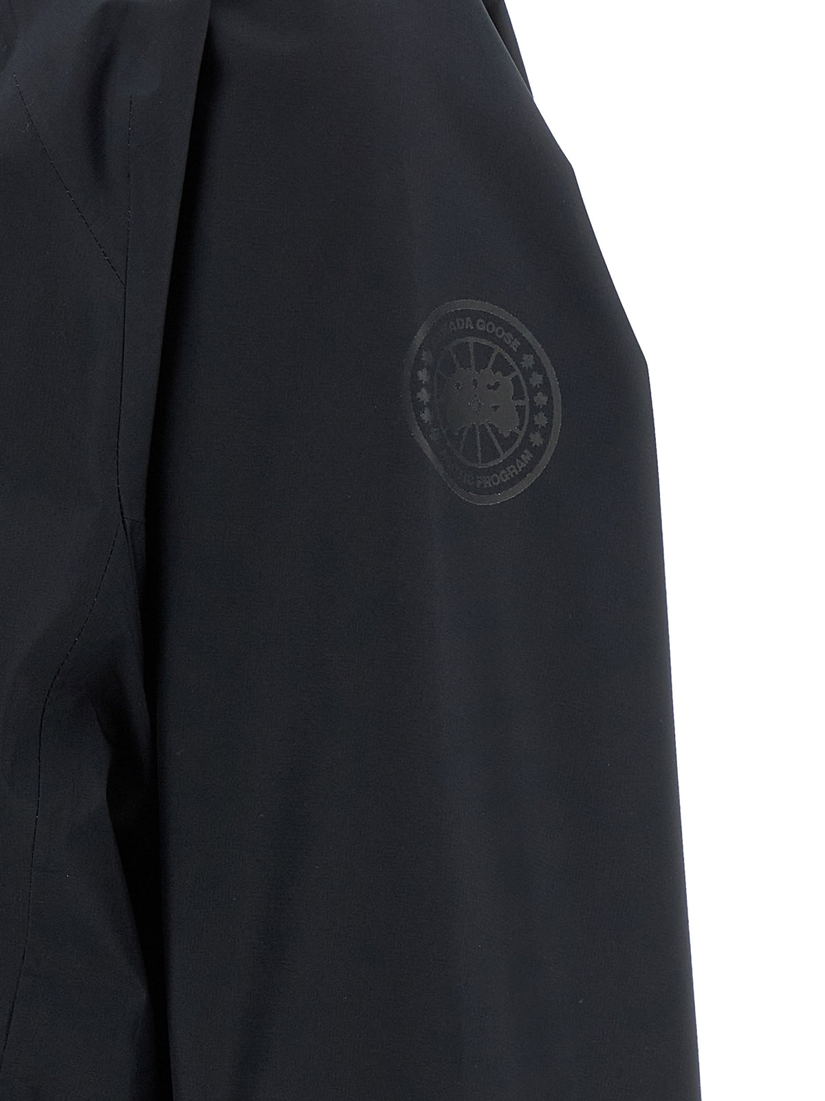 Indulge in the Canada Goose Black Polyester Shell Jacket, where minimalist elegance meets exceptional craftsmanship, redefining luxury outerwear for discerning tastes.