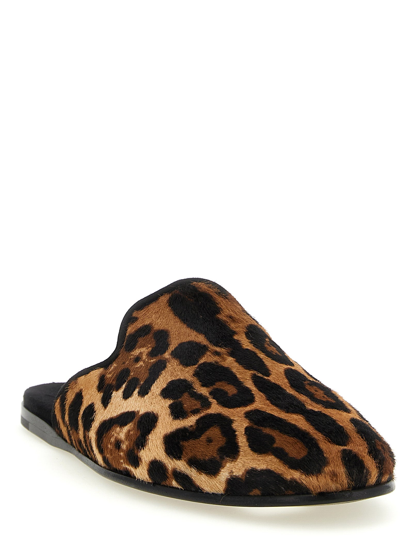 Indulge in the exquisite Dolce & Gabbana Brown Calfskin Flats, where luxurious craftsmanship meets unique artistry, perfect for those who command attention with every step.