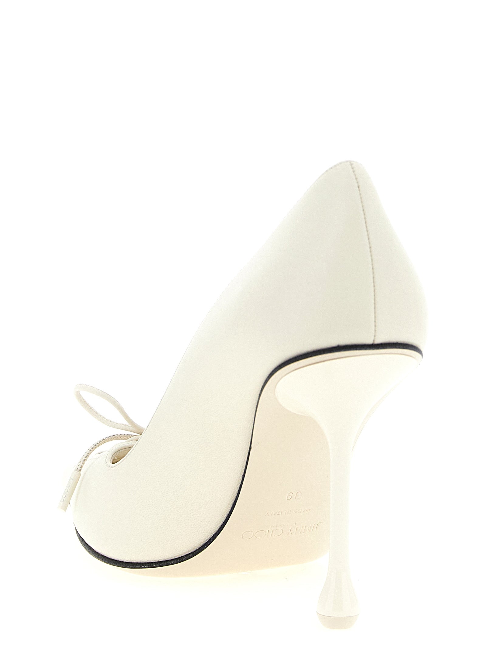 Experience the allure of Jimmy Choo's Scarlett white leather pumps, where exquisite craftsmanship meets timeless elegance, perfect for the discerning individual.