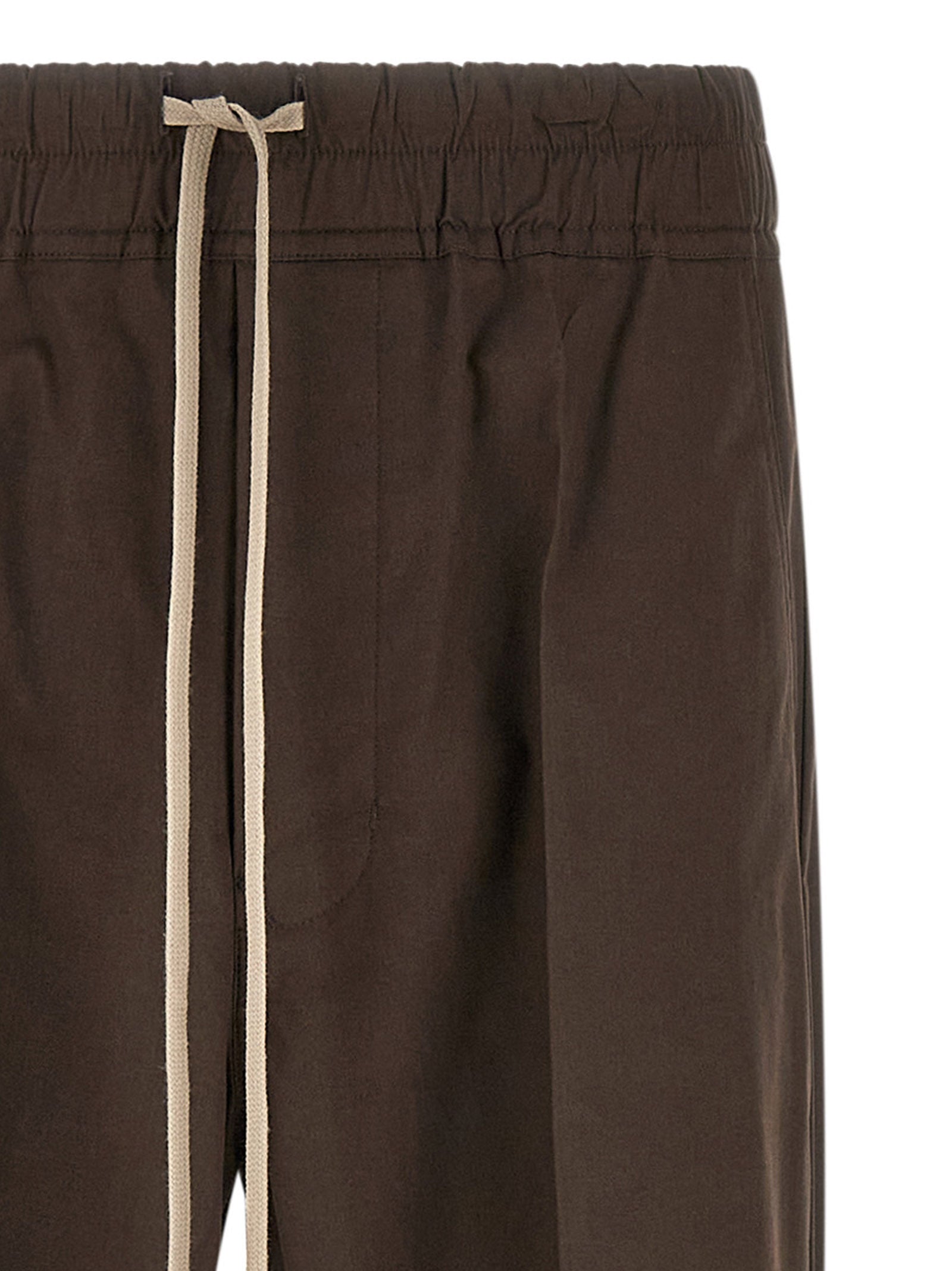 Elevate your wardrobe with Rick Owens' Dietrich Drawstring cotton pants, a fusion of bold design and luxurious comfort, perfect for the modern connoisseur.