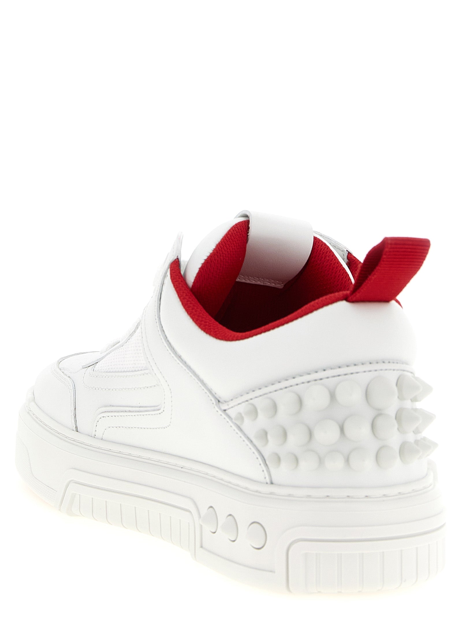 Elevate your style with Christian Louboutin's Astroloubi 2 sneakers, where luxurious calfskin meets bold design, embodying sophistication and urban allure.