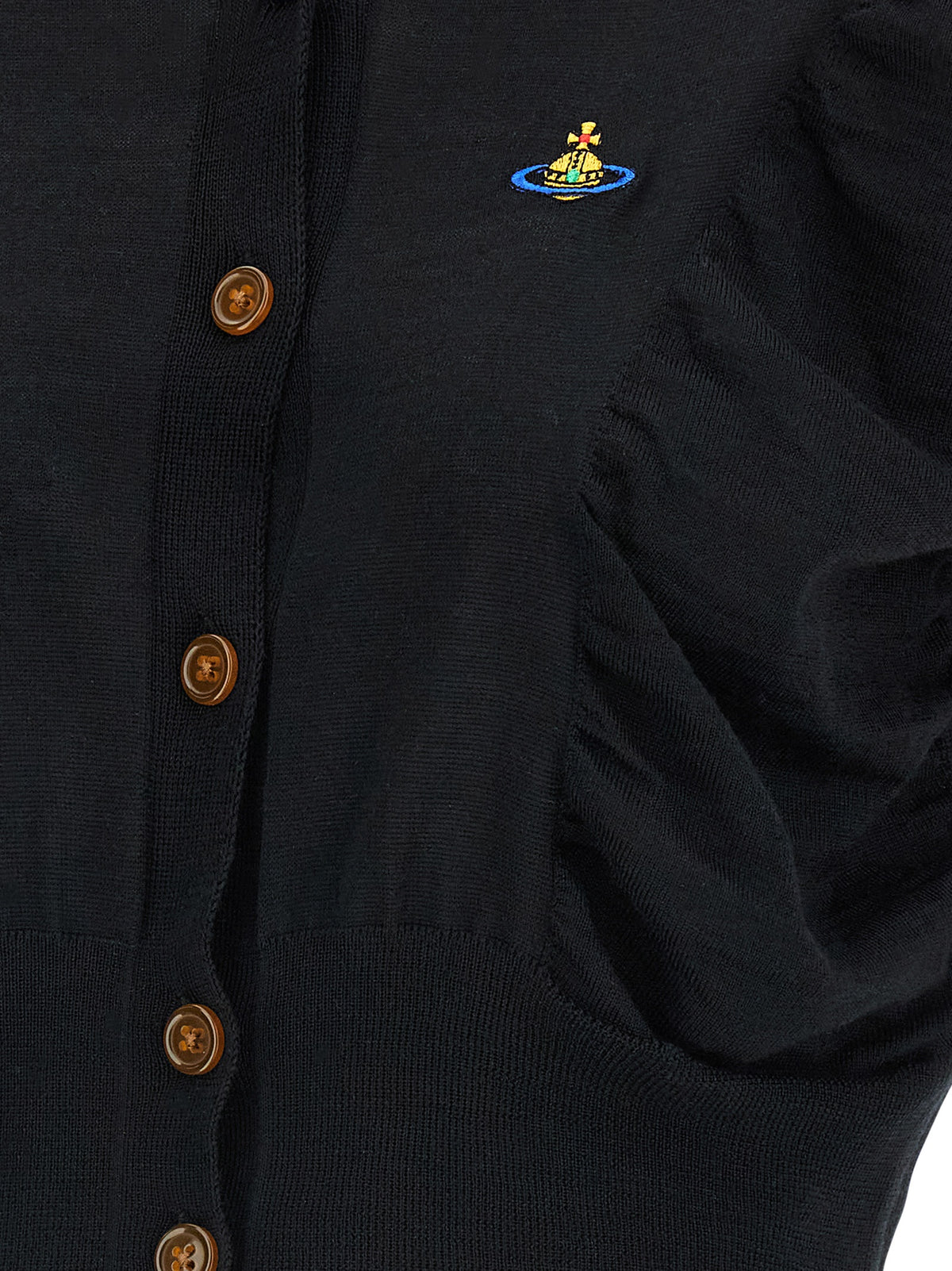 Experience the allure of the Vivienne Westwood Black Wool Cardigan, a masterpiece of Italian craftsmanship blending wool and silk for timeless elegance and sophistication.